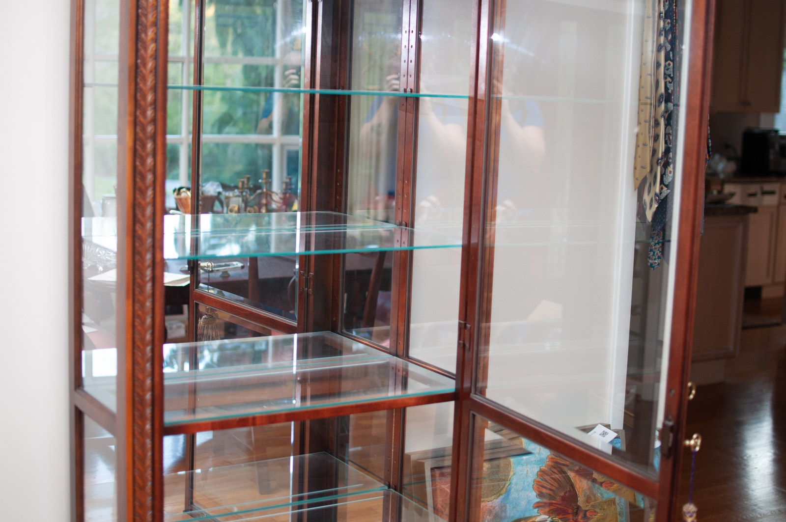 Neoclassical Style Walnut Finish "Armand" Curio Cabinet by Howard Miller