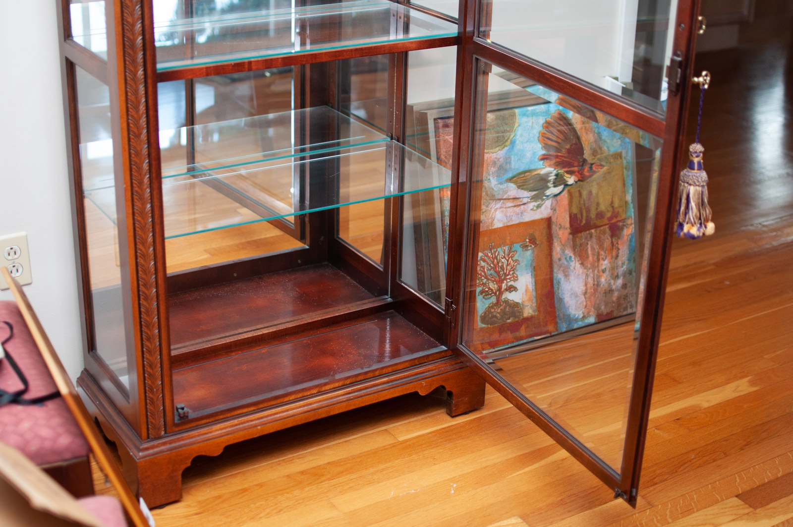 Neoclassical Style Walnut Finish "Armand" Curio Cabinet by Howard Miller