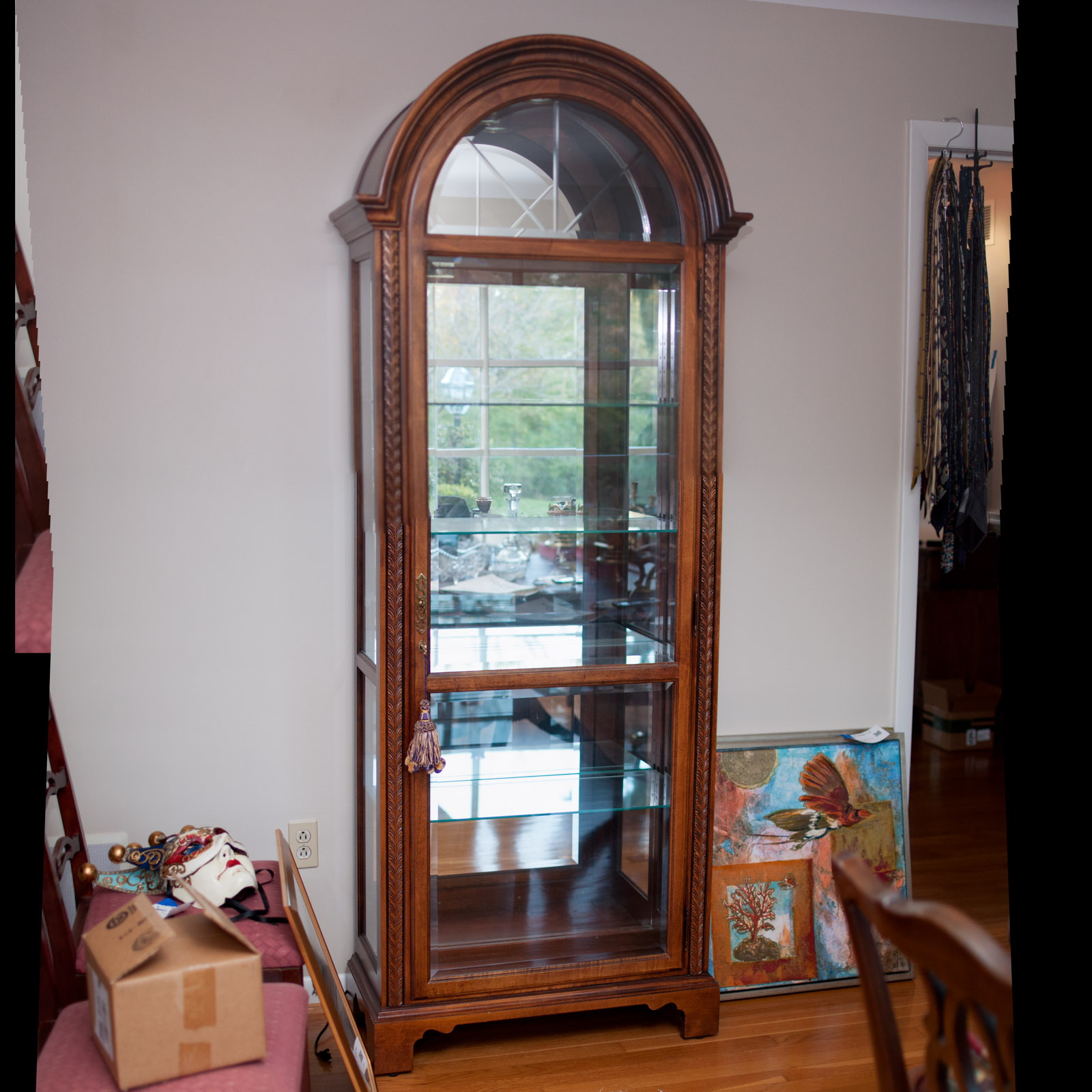 Neoclassical Style Walnut Finish "Armand" Curio Cabinet by Howard Miller