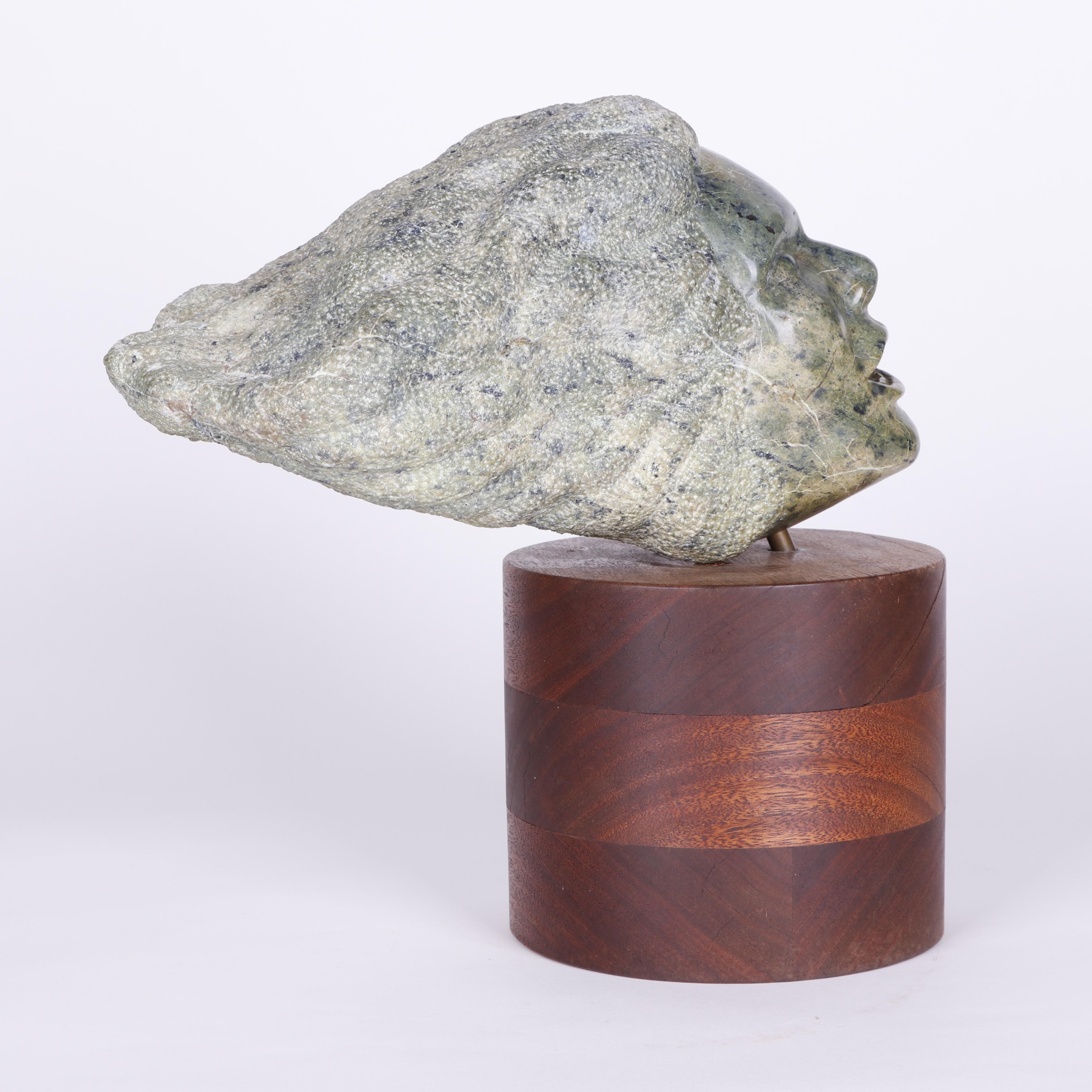 R. Thorn Carved Stone Bust on Cylindrical Wooden Plinth