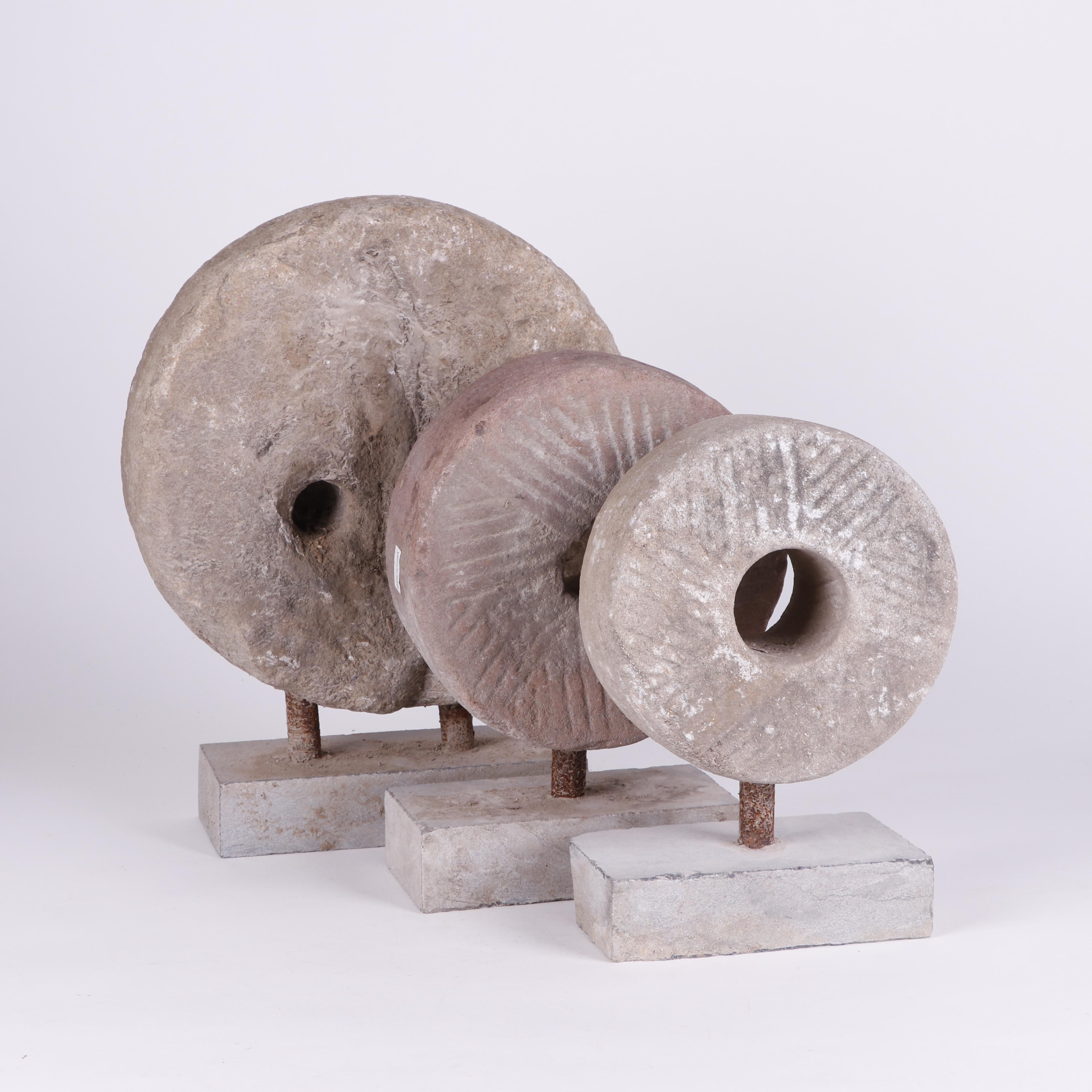 Mounted Mill Stone Sculptures