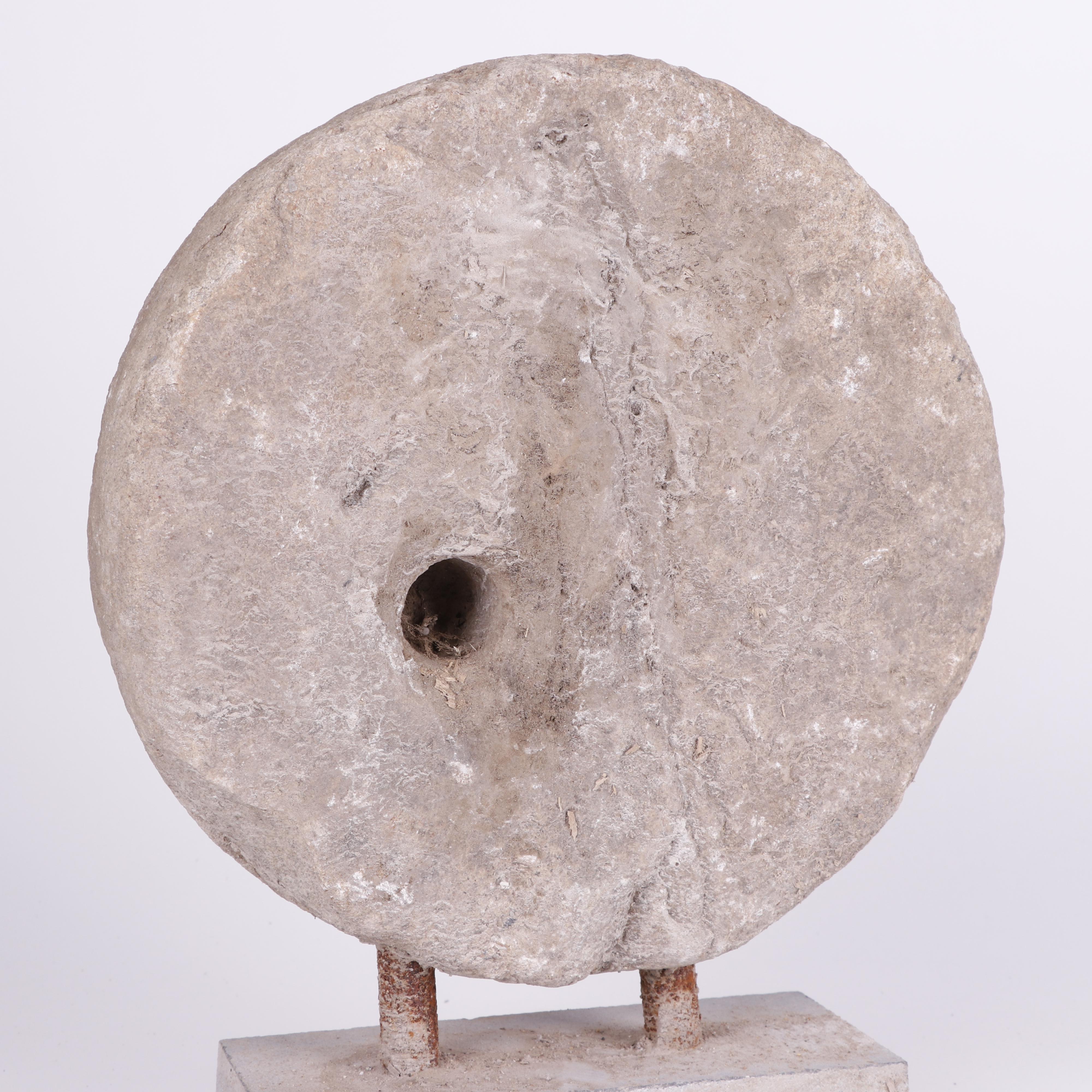 Mounted Mill Stone Sculptures