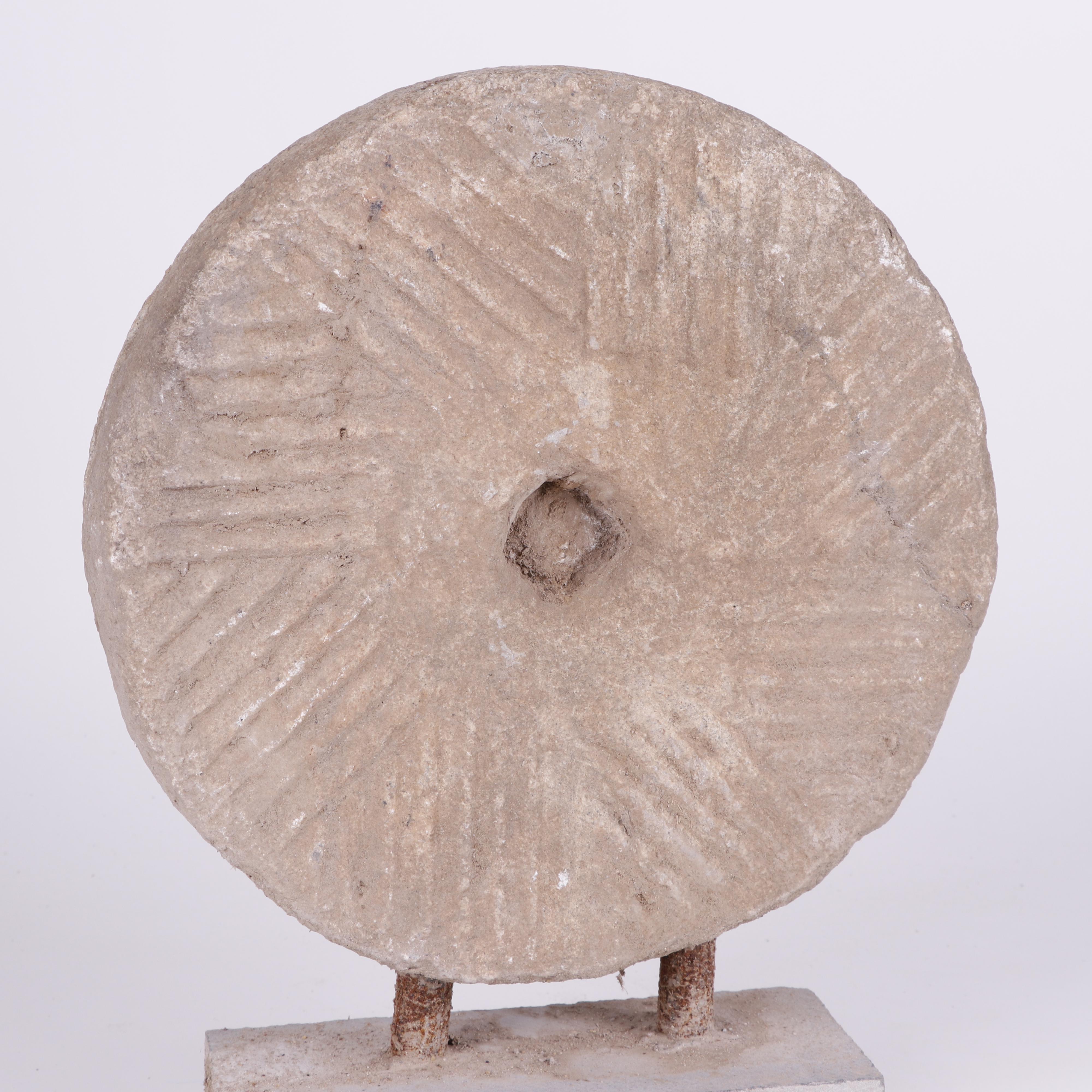 Mounted Mill Stone Sculptures