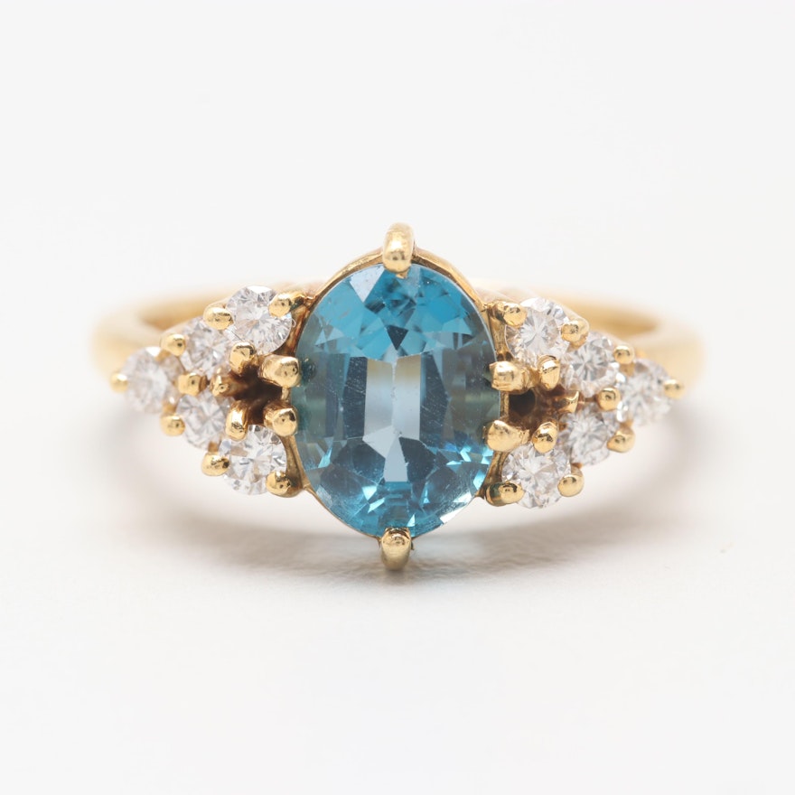 Circa 1960s 18K Yellow Gold Blue Topaz and Diamond Ring