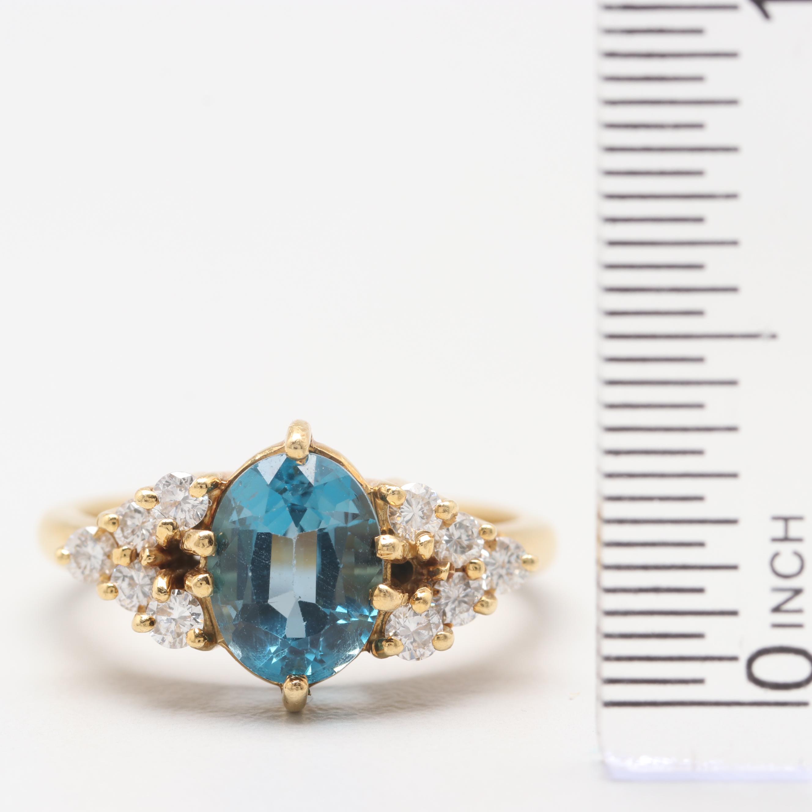 Circa 1960s 18K Yellow Gold Blue Topaz and Diamond Ring