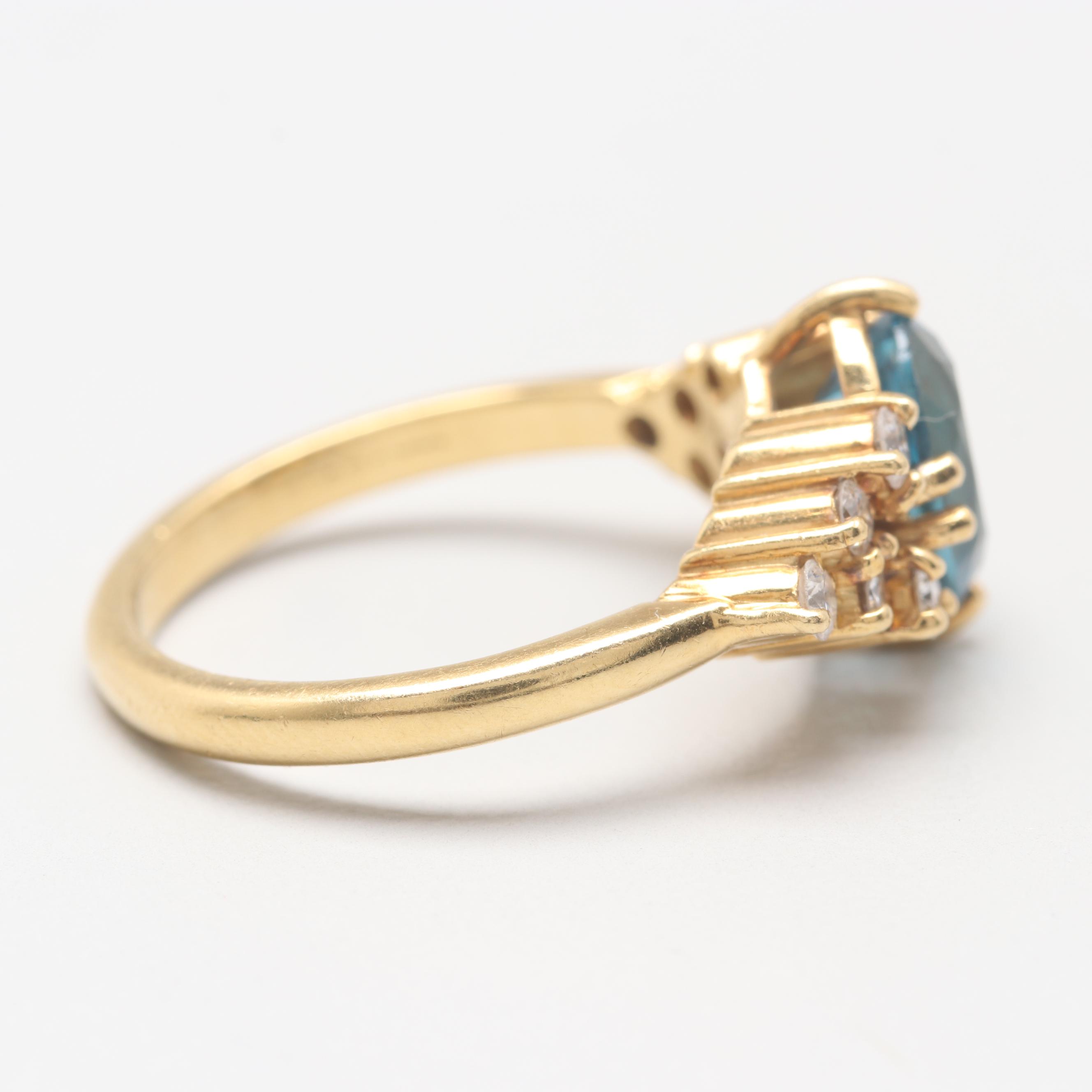 Circa 1960s 18K Yellow Gold Blue Topaz and Diamond Ring