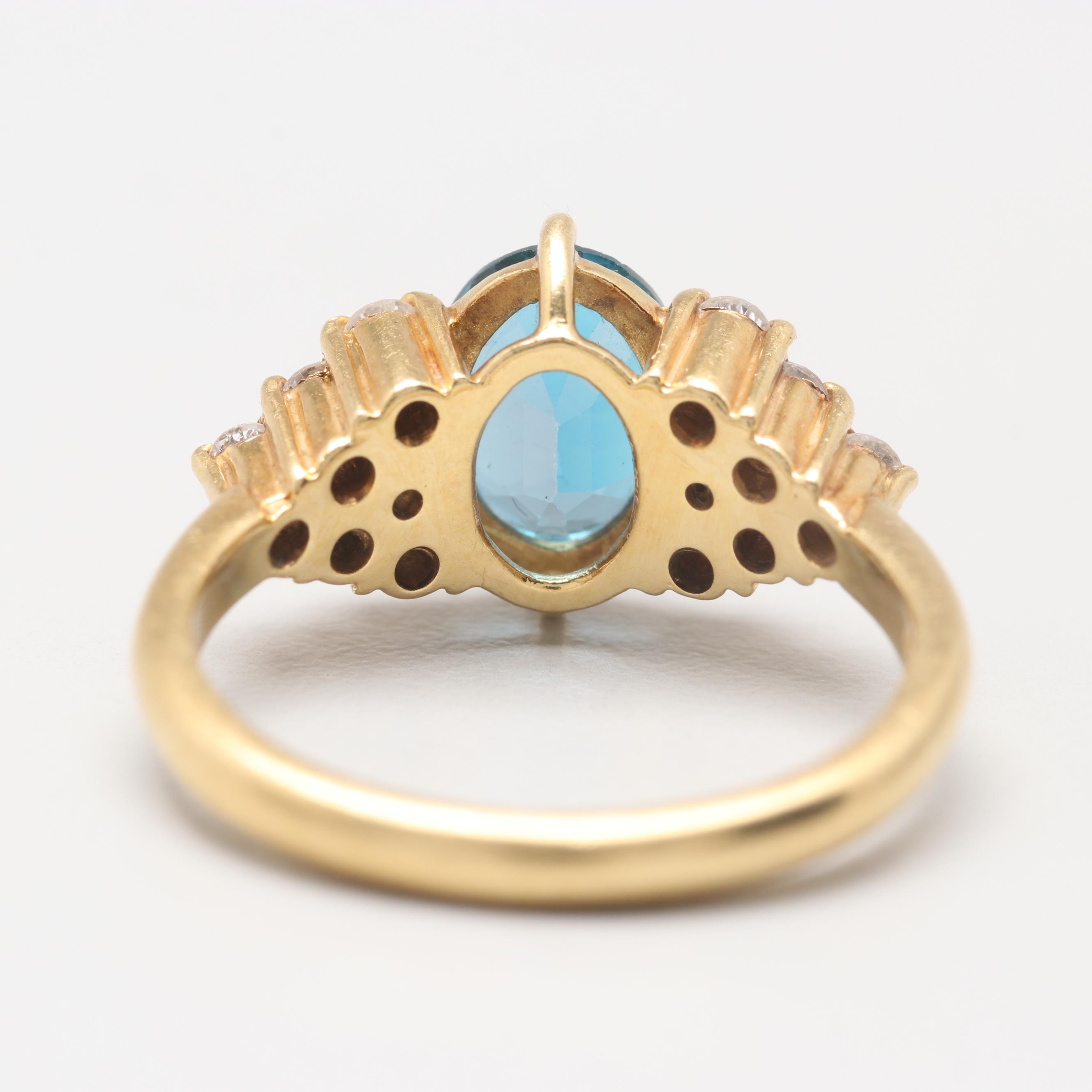 Circa 1960s 18K Yellow Gold Blue Topaz and Diamond Ring