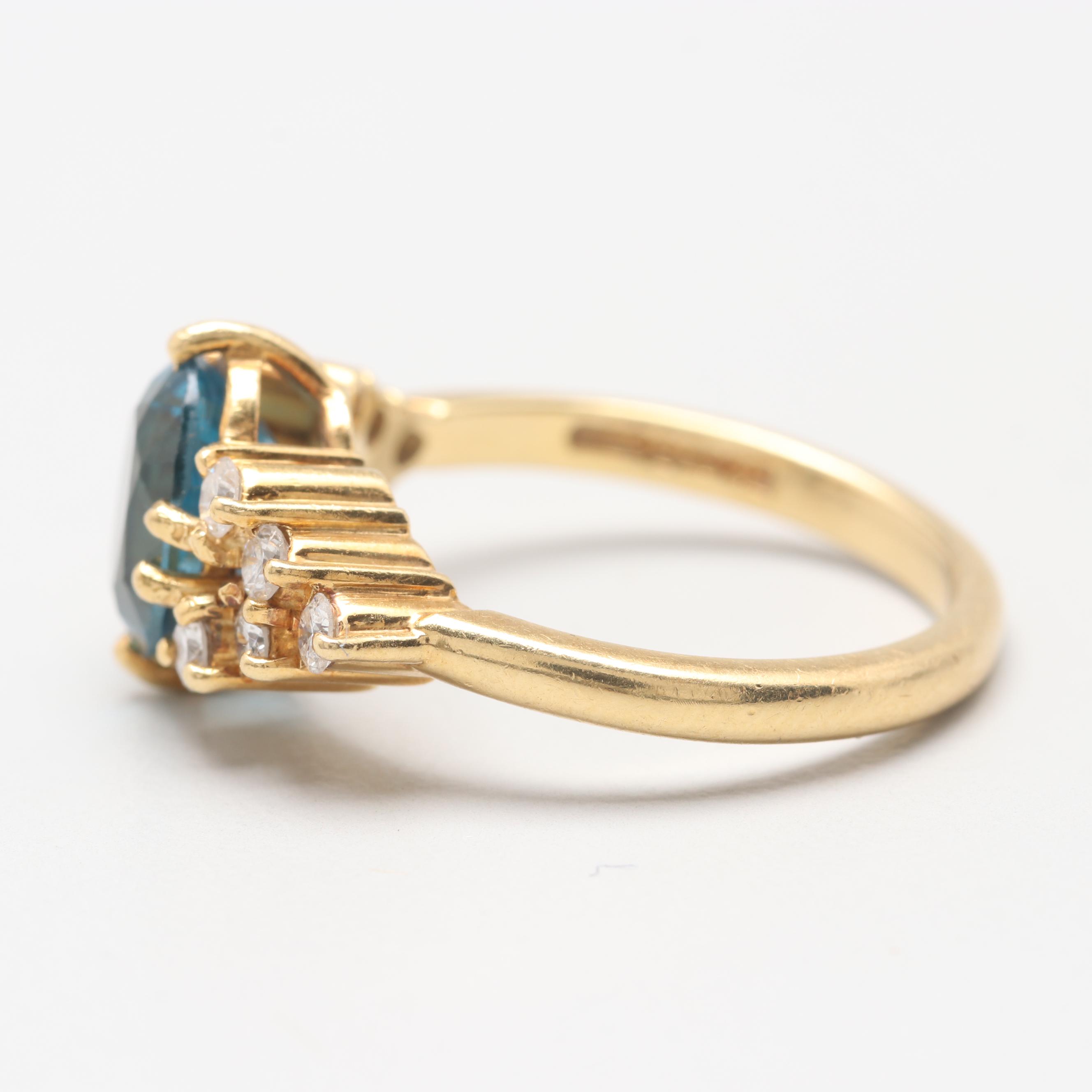 Circa 1960s 18K Yellow Gold Blue Topaz and Diamond Ring