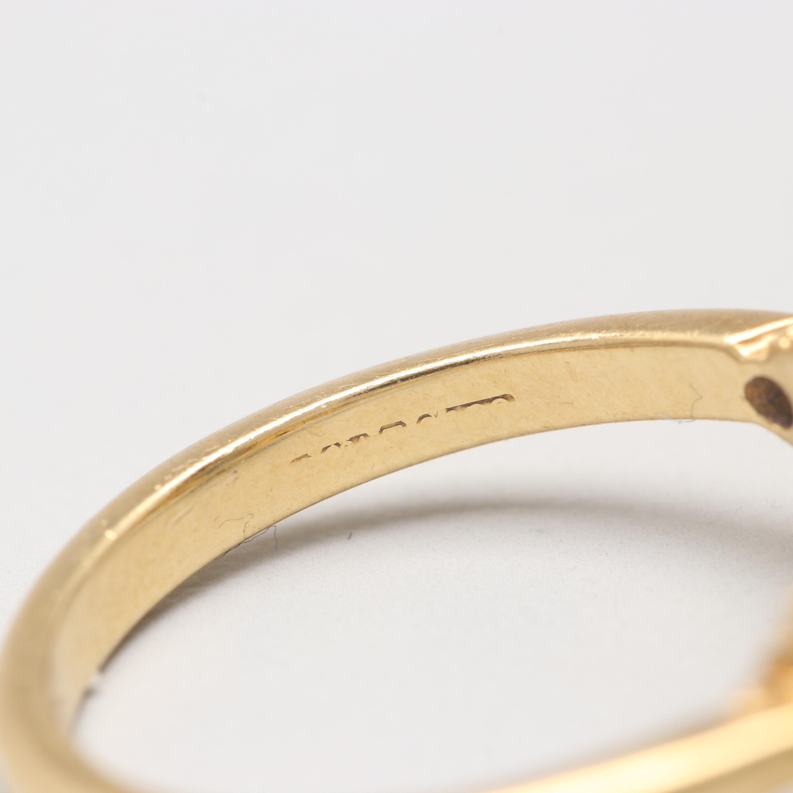 Circa 1960s 18K Yellow Gold Blue Topaz and Diamond Ring