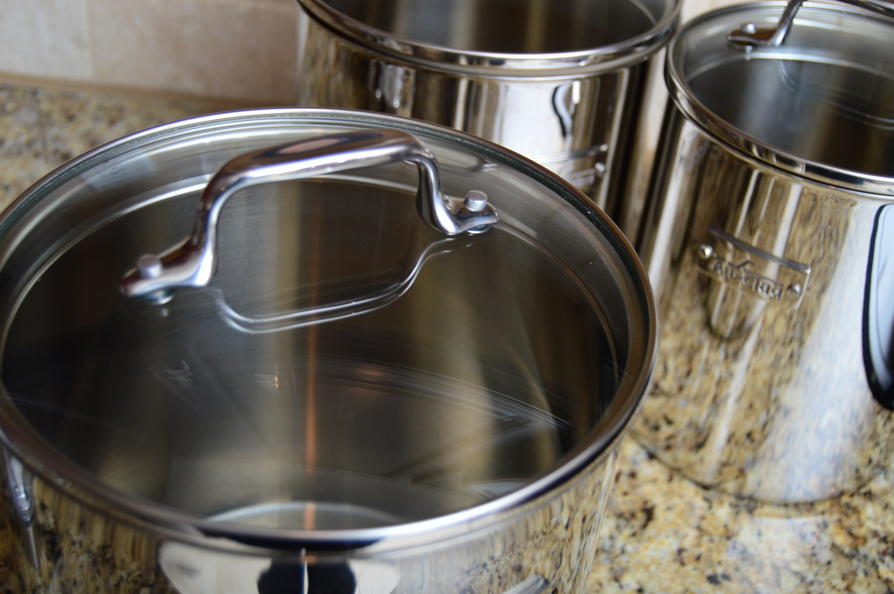 All-Clad Canister Set Plus Chrome Kitchen Essentials