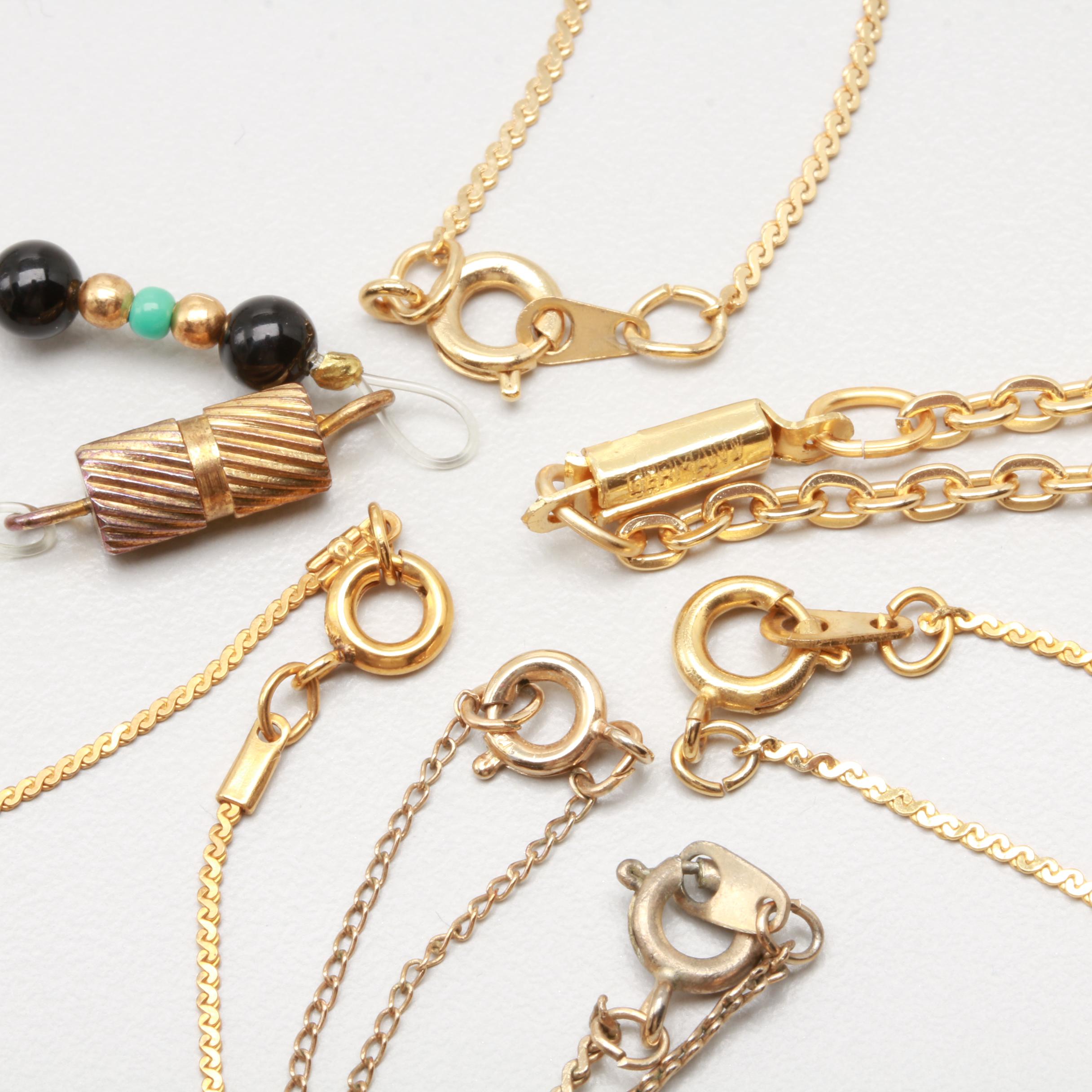 Assorted Gold Tone Shell, Bone and Glass Costume Jewelry