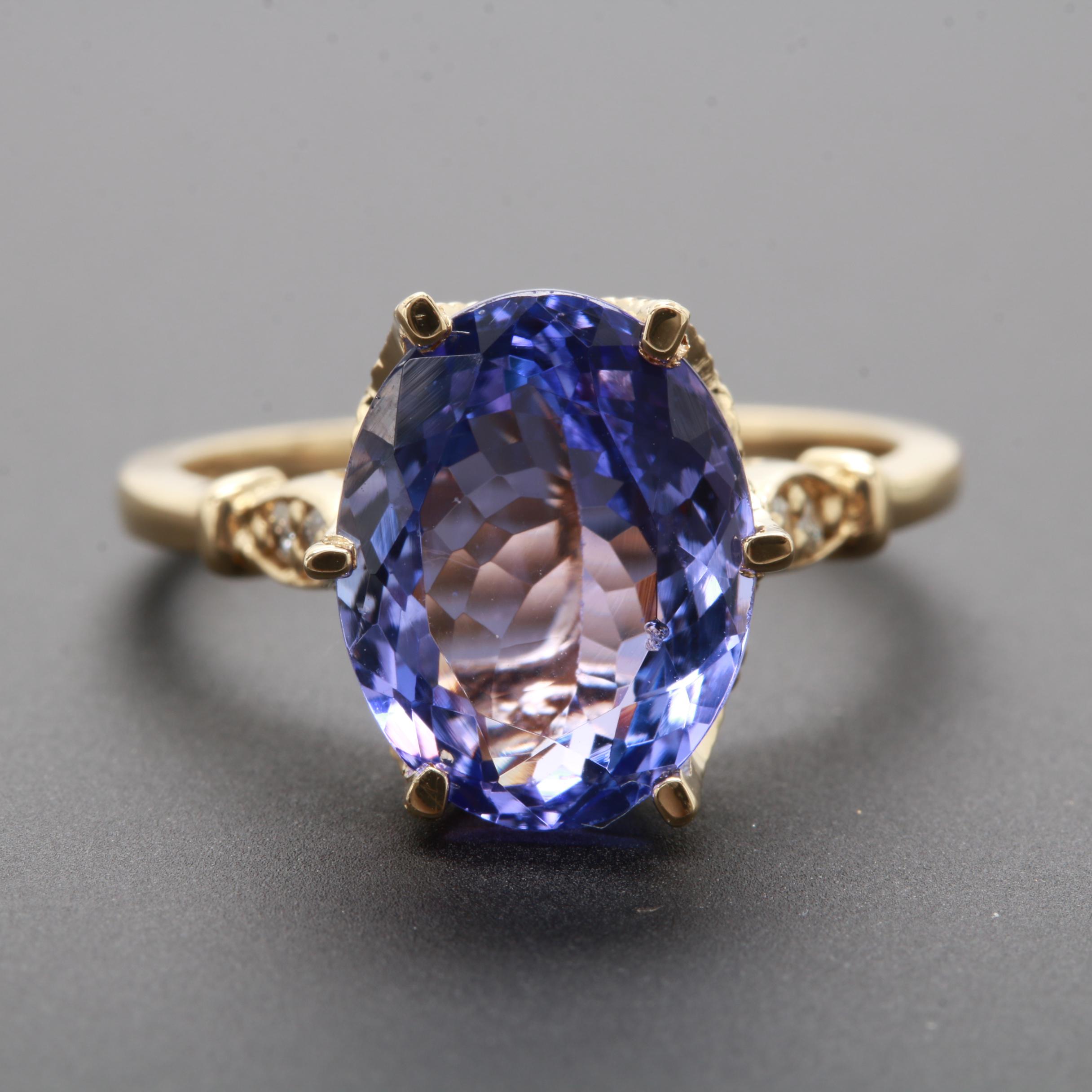 14K Yellow Gold 3.77 CT Tanzanite and Diamond Ring