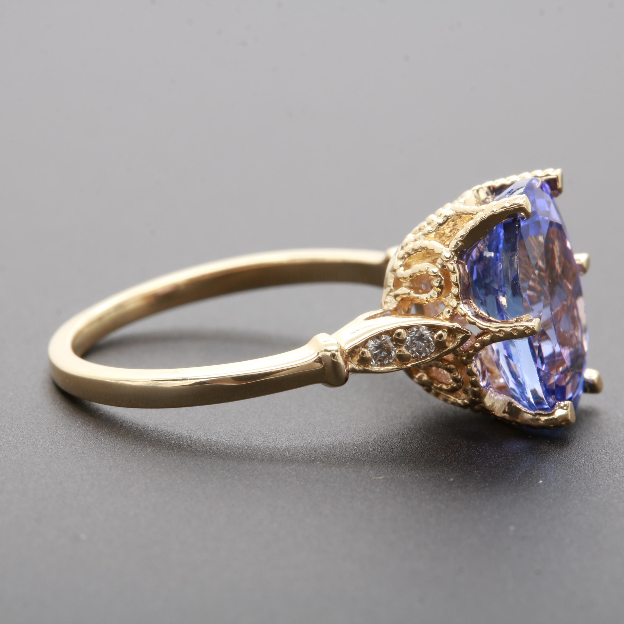 14K Yellow Gold 3.77 CT Tanzanite and Diamond Ring