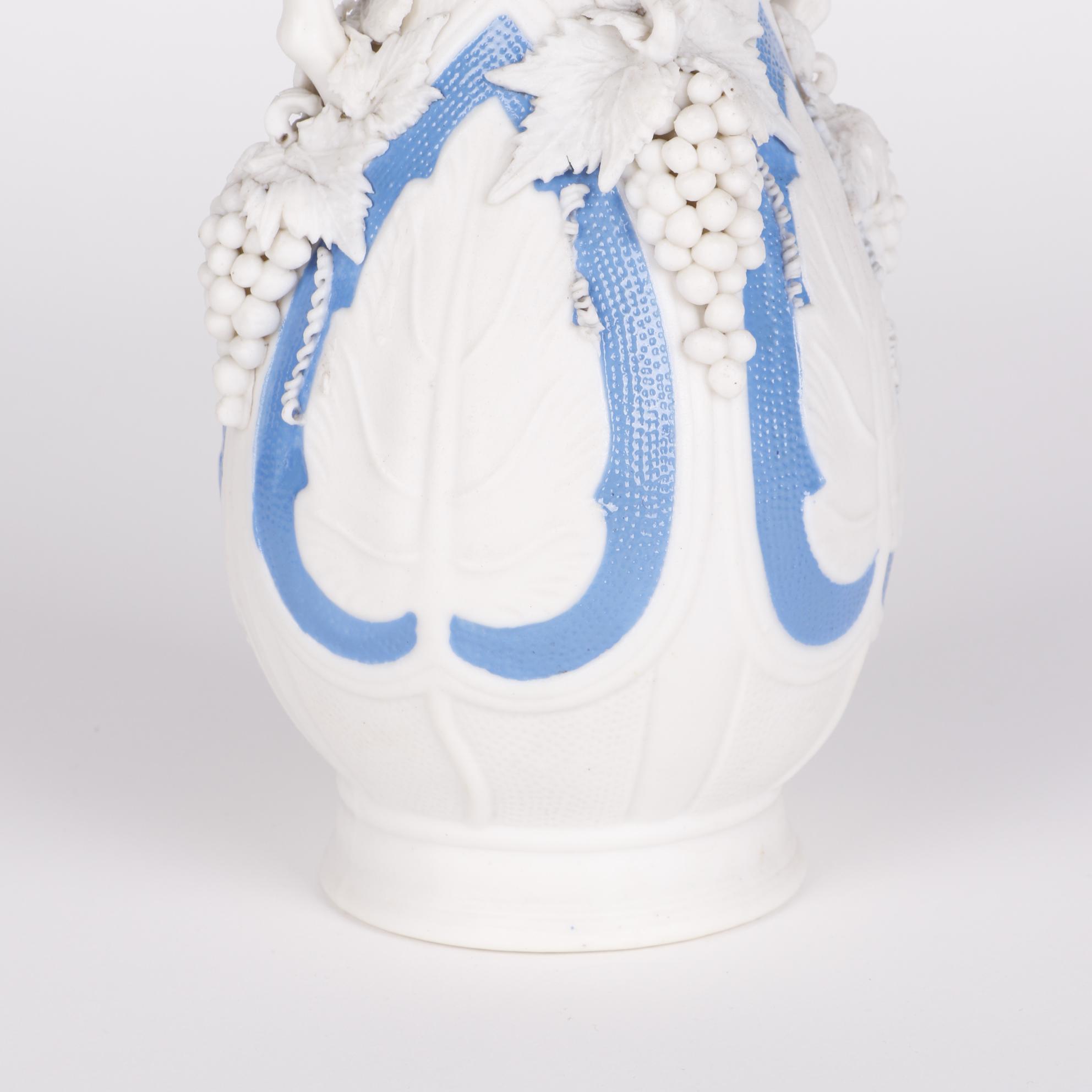 Blue and White Parianware Vases With Applied Grape Clusters