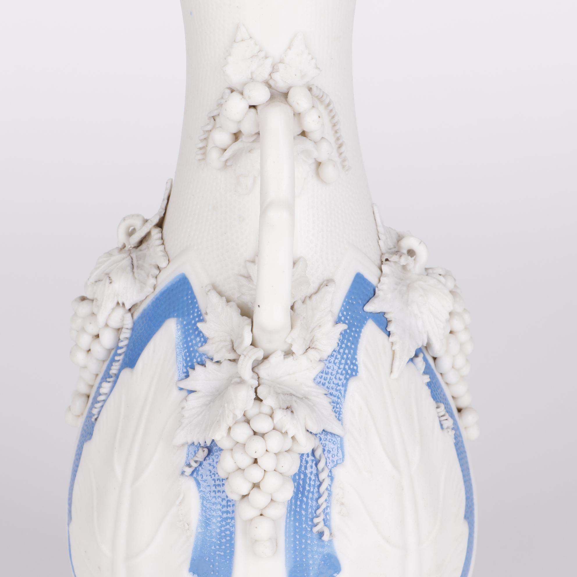 Blue and White Parianware Vases With Applied Grape Clusters