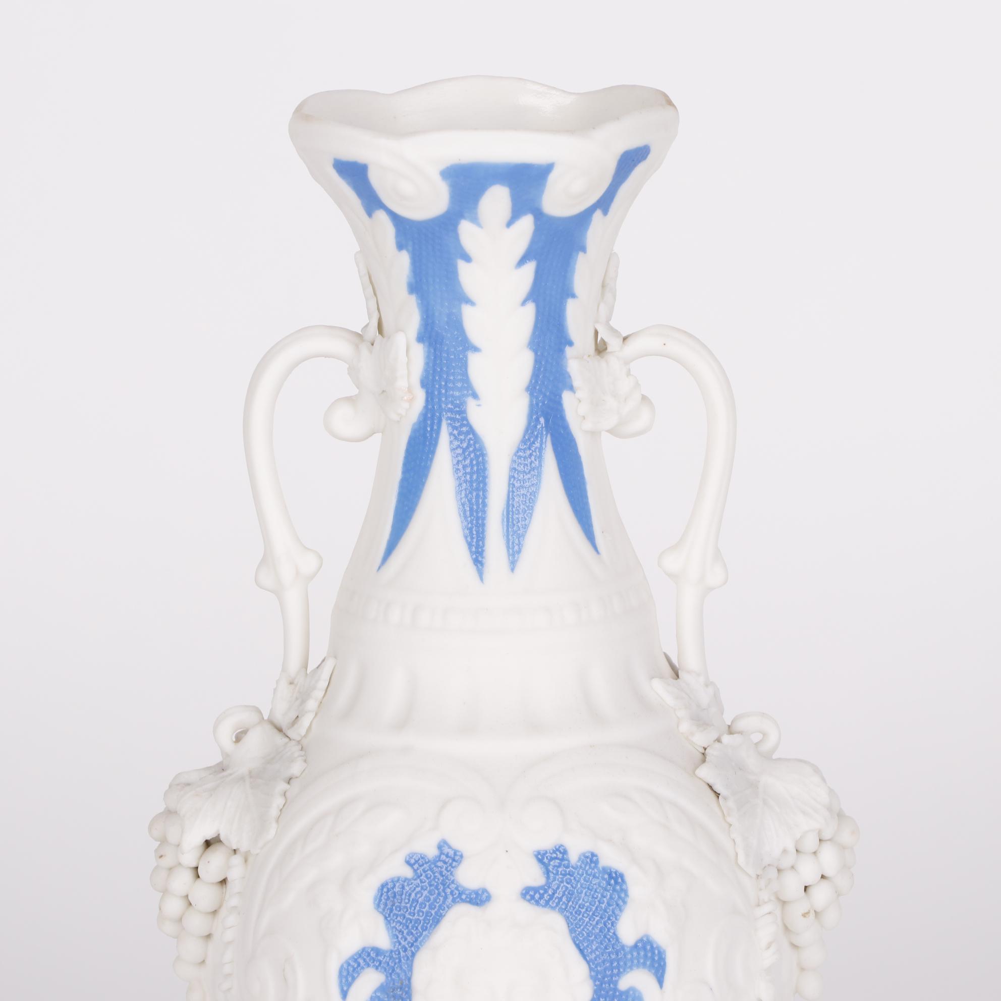 Blue and White Parianware Vases With Applied Grape Clusters