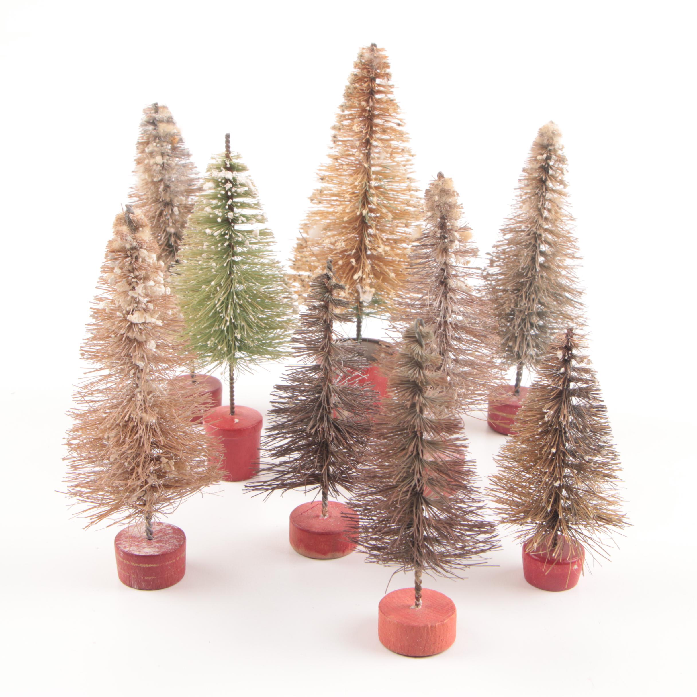 Collection of Seven Vintage Miniature Flocked Bottle Brush Christmas Trees