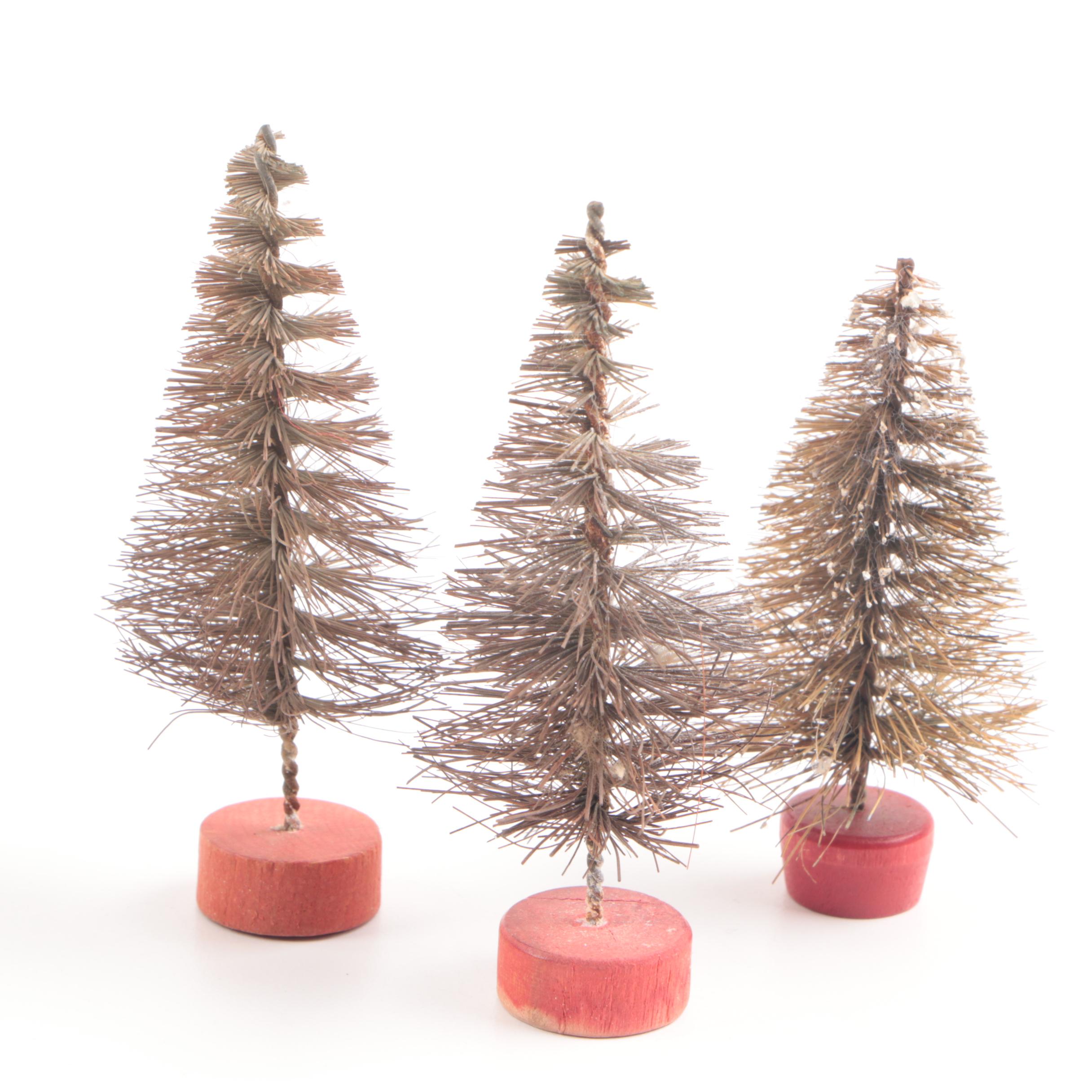 Collection of Seven Vintage Miniature Flocked Bottle Brush Christmas Trees