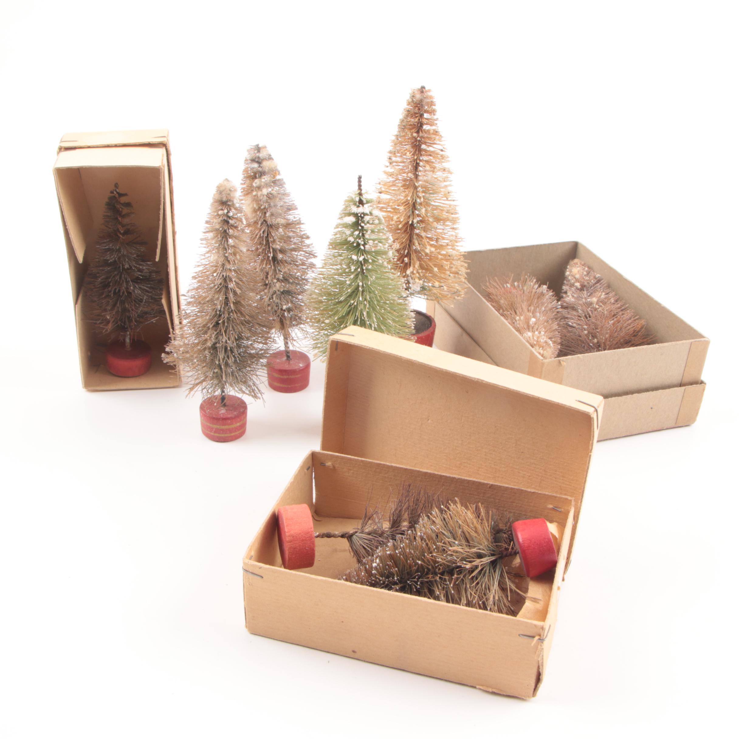 Collection of Seven Vintage Miniature Flocked Bottle Brush Christmas Trees