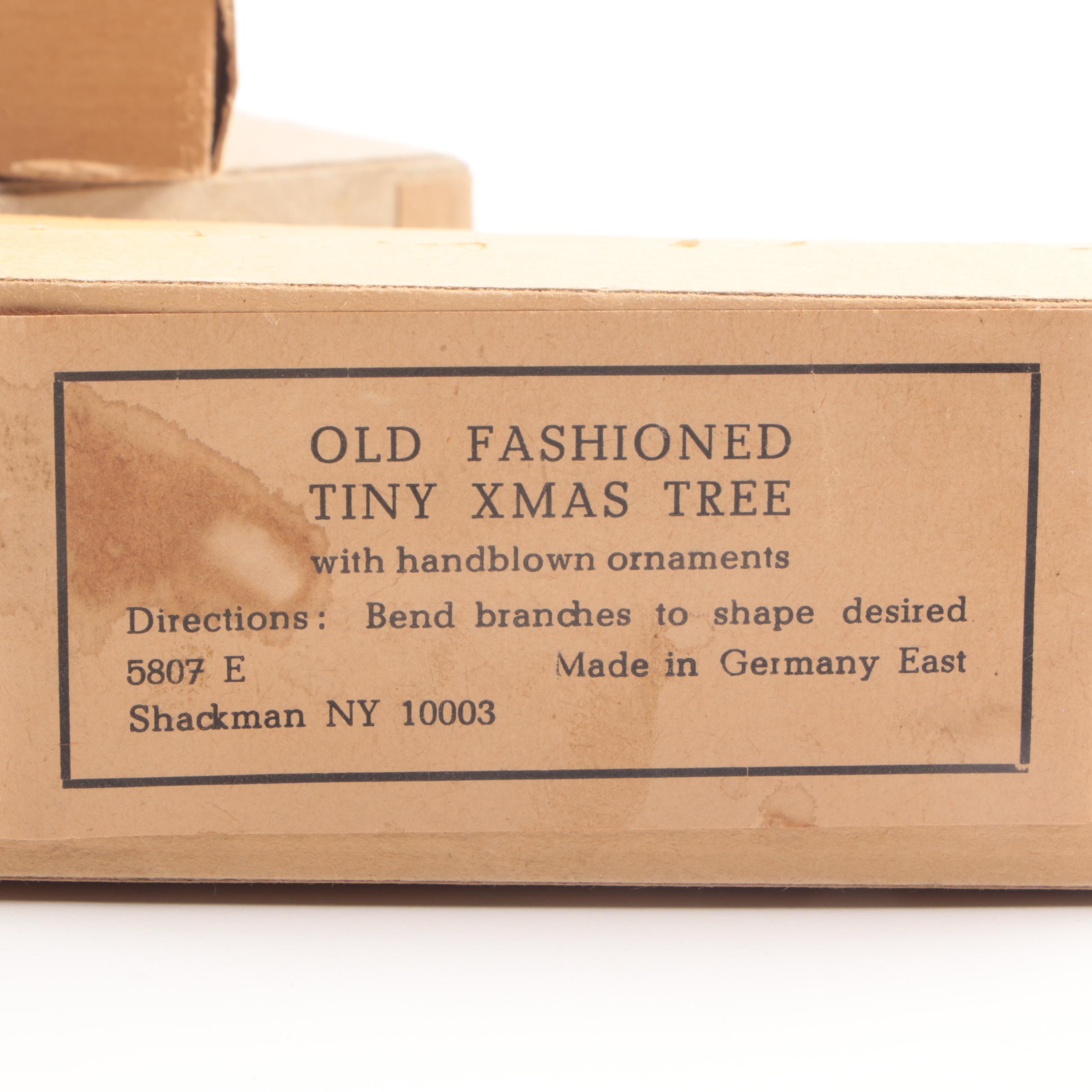 Collection of Seven Vintage Miniature Flocked Bottle Brush Christmas Trees