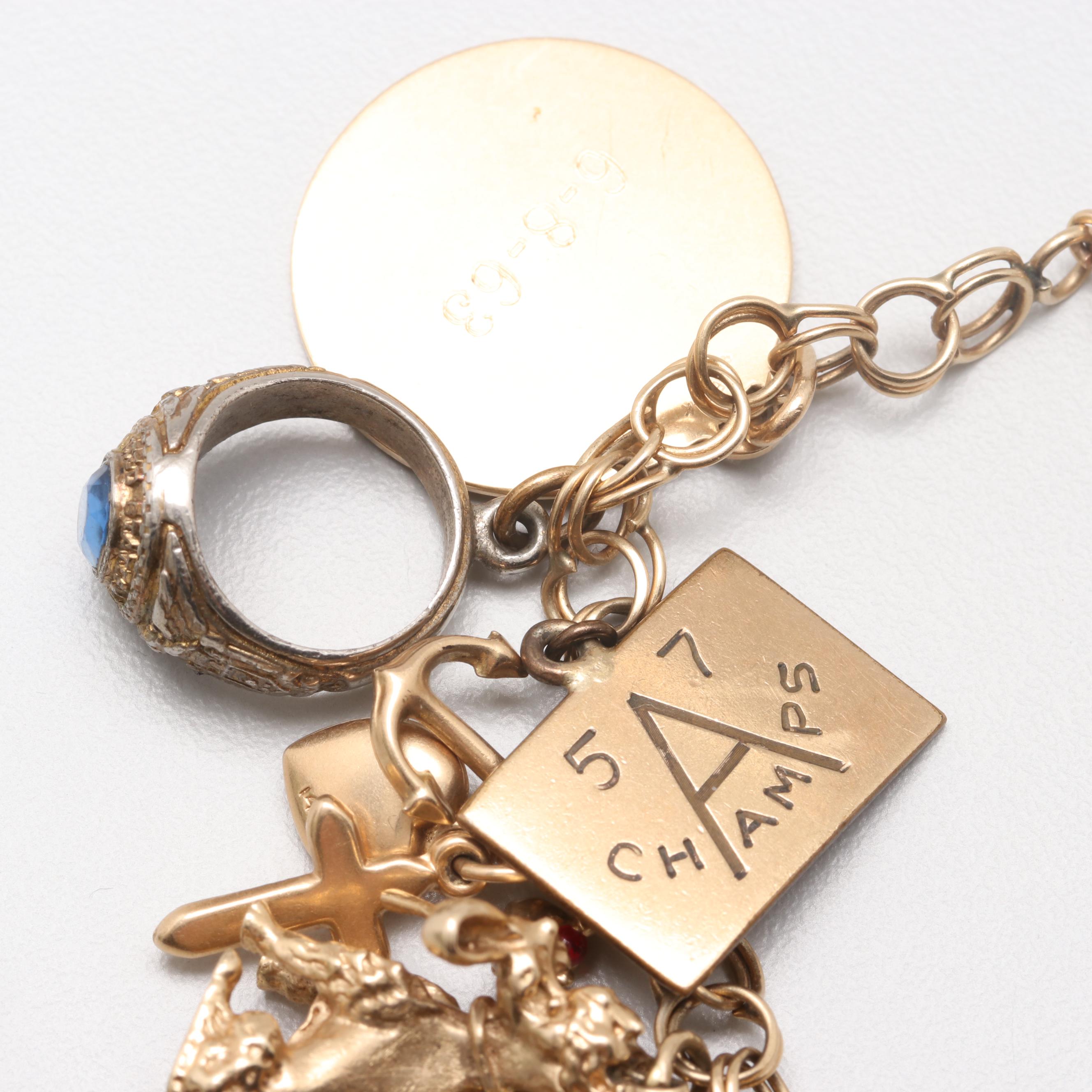14K Yellow Gold Charm Bracelet with 14K, 10K Yellow Gold and Gold Tone Charms