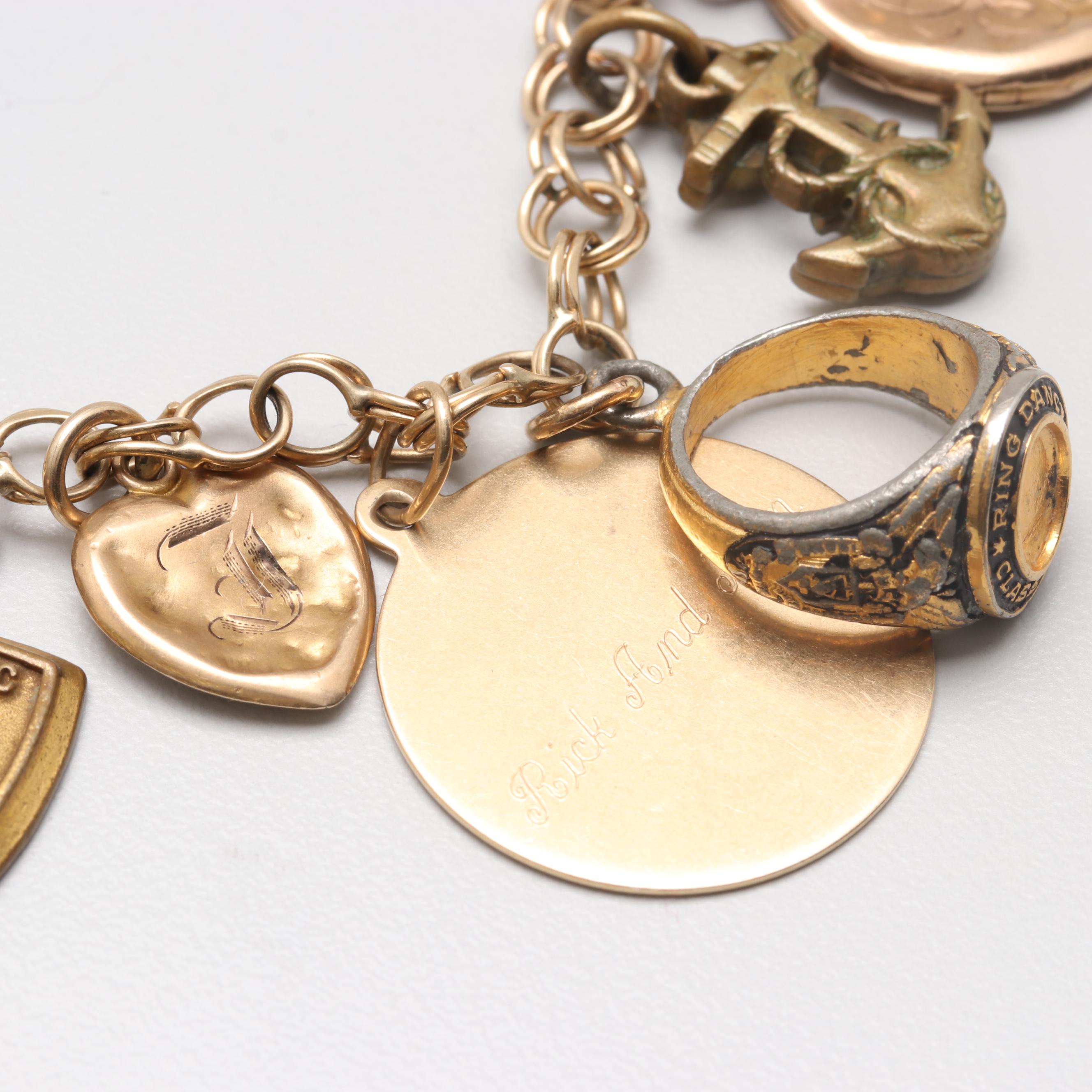14K Yellow Gold Charm Bracelet with 14K, 10K Yellow Gold and Gold Tone Charms