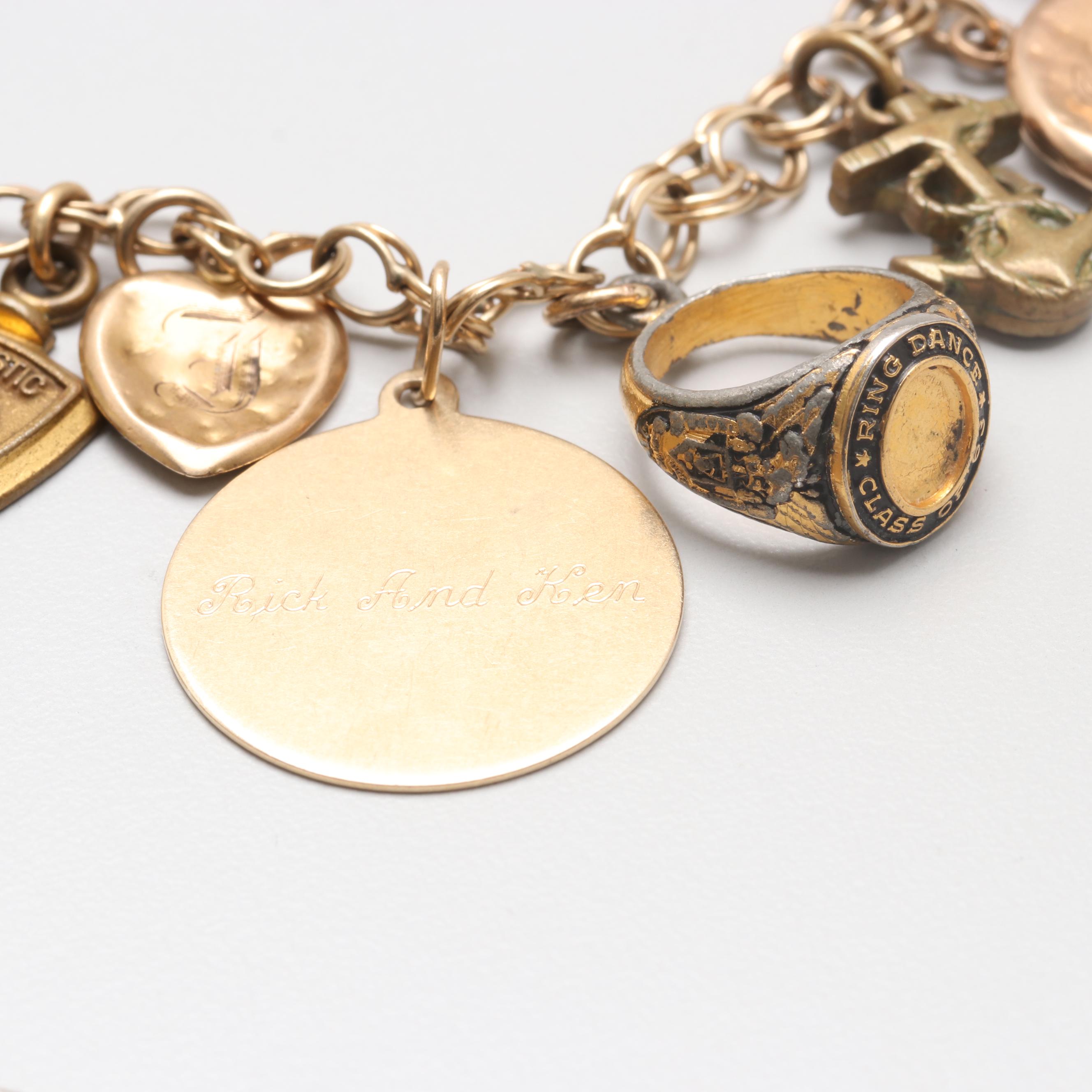 14K Yellow Gold Charm Bracelet with 14K, 10K Yellow Gold and Gold Tone Charms