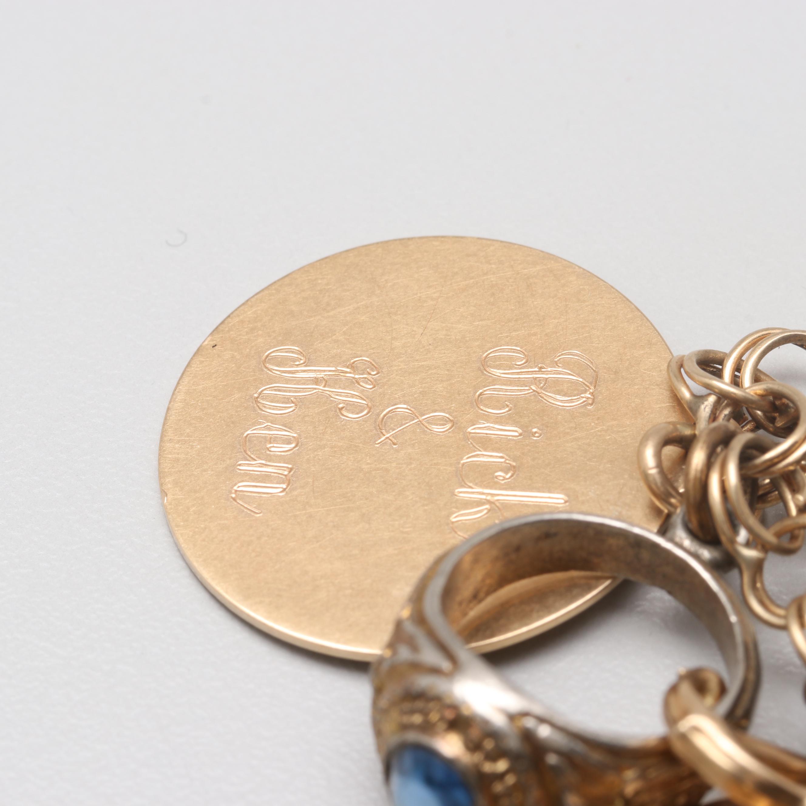 14K Yellow Gold Charm Bracelet with 14K, 10K Yellow Gold and Gold Tone Charms