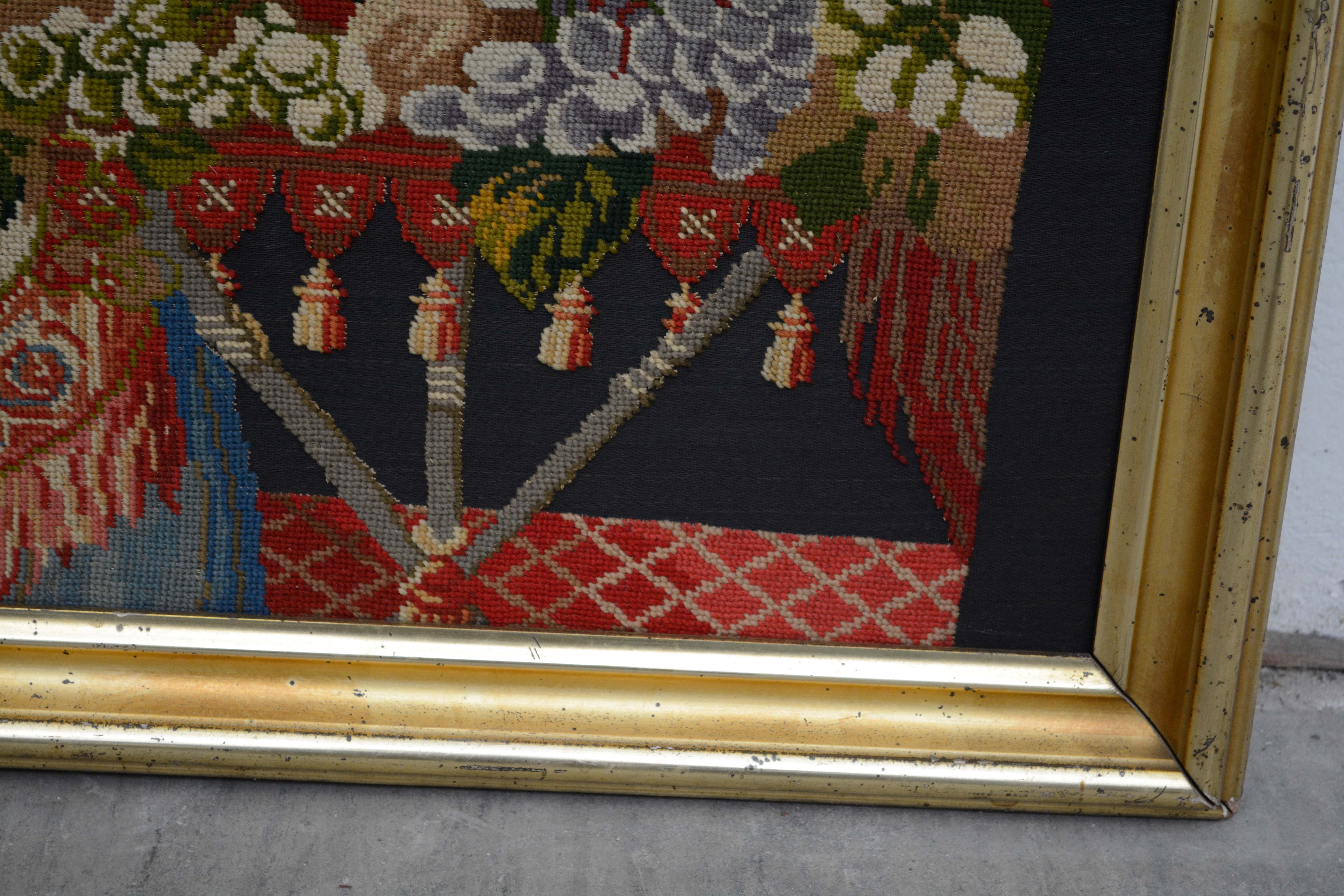 Needlepoint of Woman Feeding a Parrot