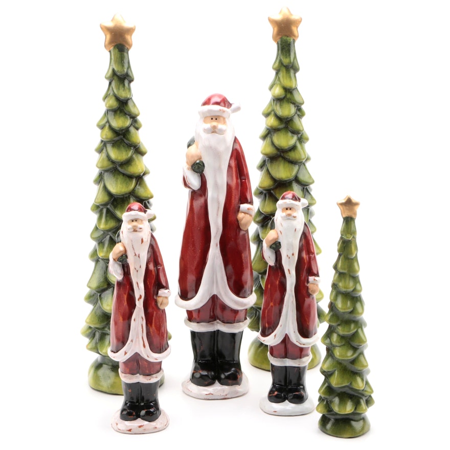 Tall Painted Clay Santa Claus and Christmas Tree Sculptures