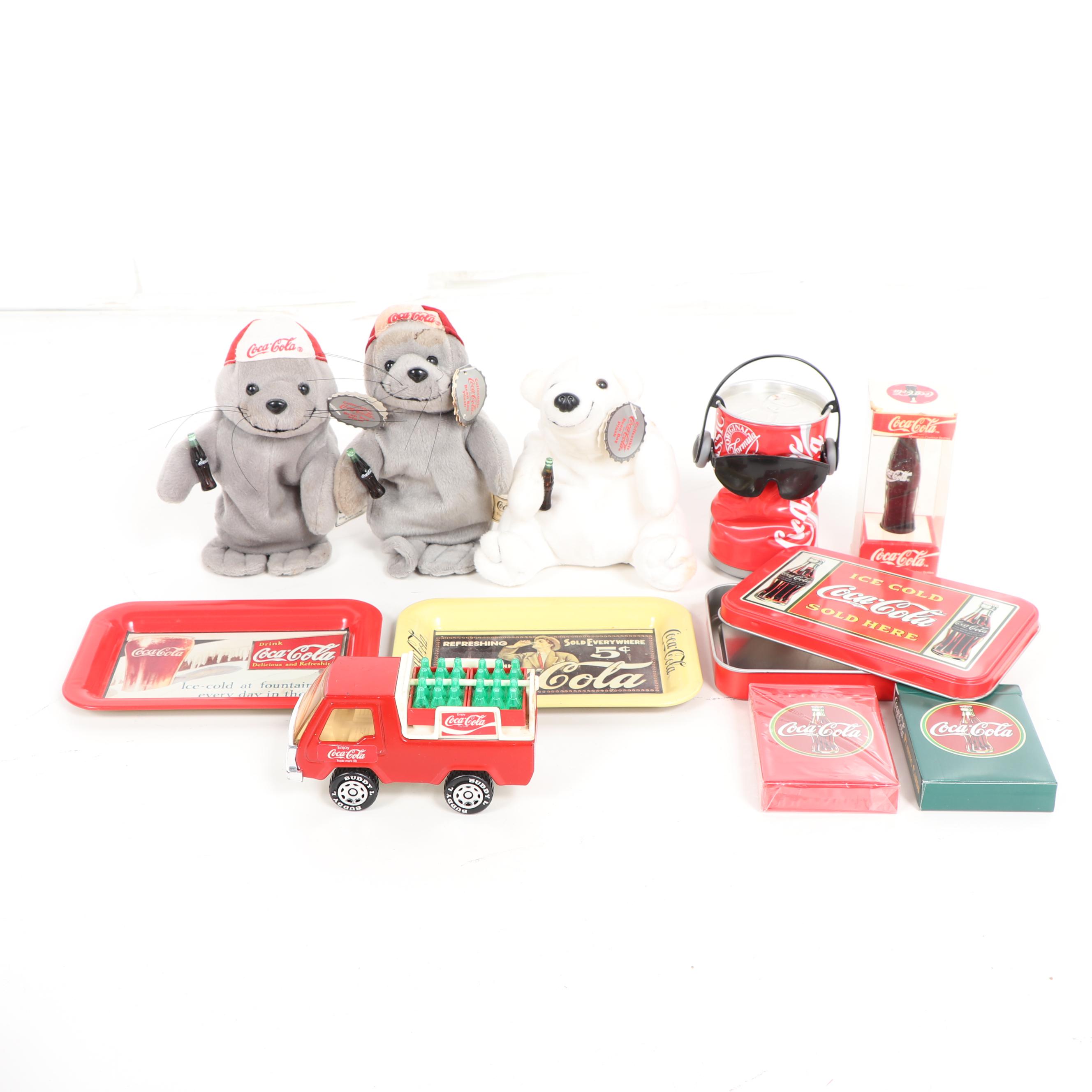 Coca-Cola Bottles, Cans, Figurines and Other Memorabilia