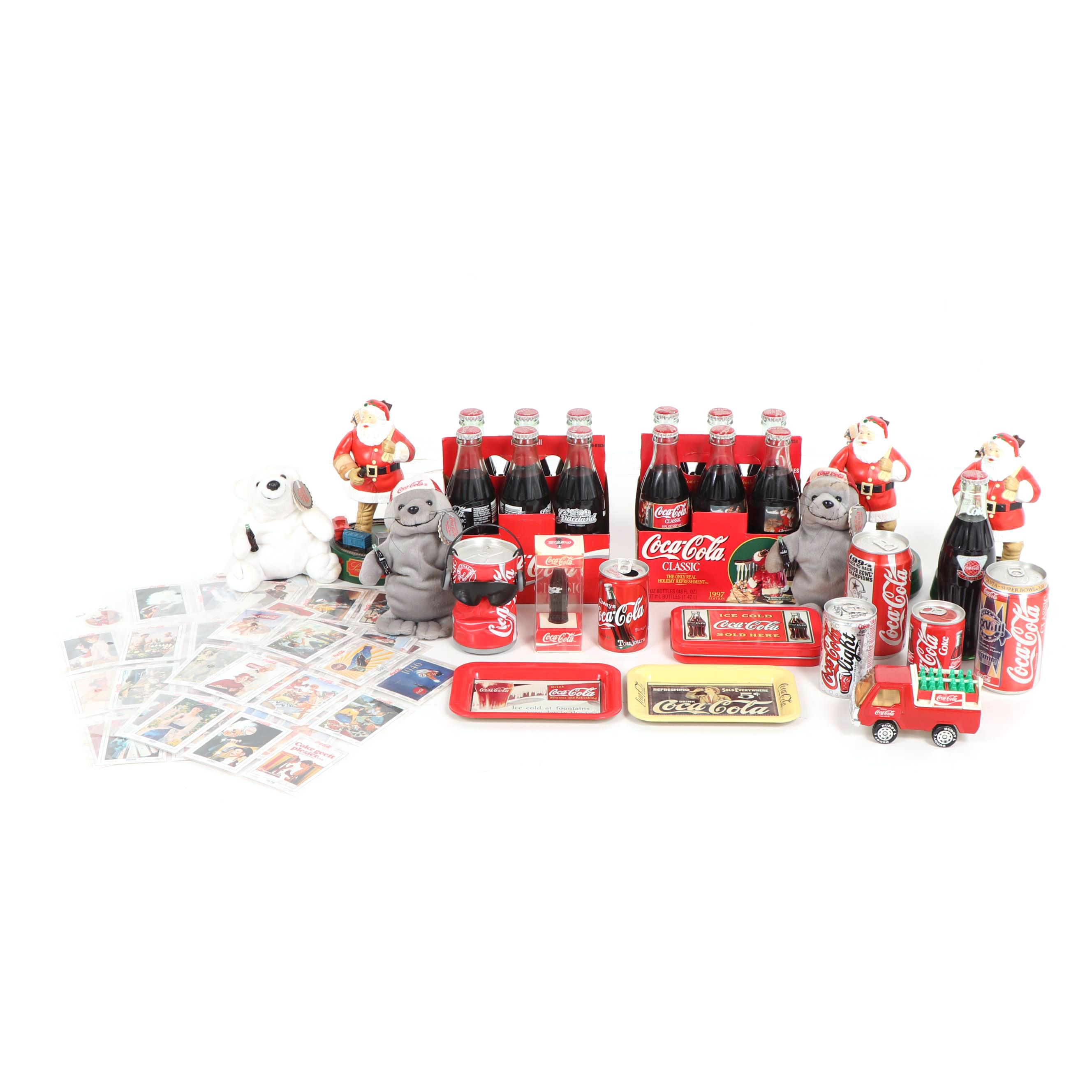 Coca-Cola Bottles, Cans, Figurines and Other Memorabilia