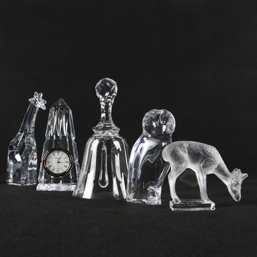 Lalique Deer, Orrefors Giraffe, Baccarat Owl and Bell, with Waterford Desk Clock