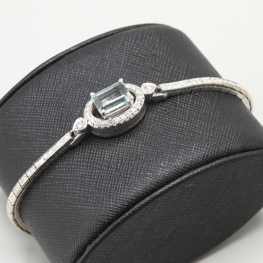 14K White Gold Blue Topaz and 1.08 CTW Diamond Bracelet