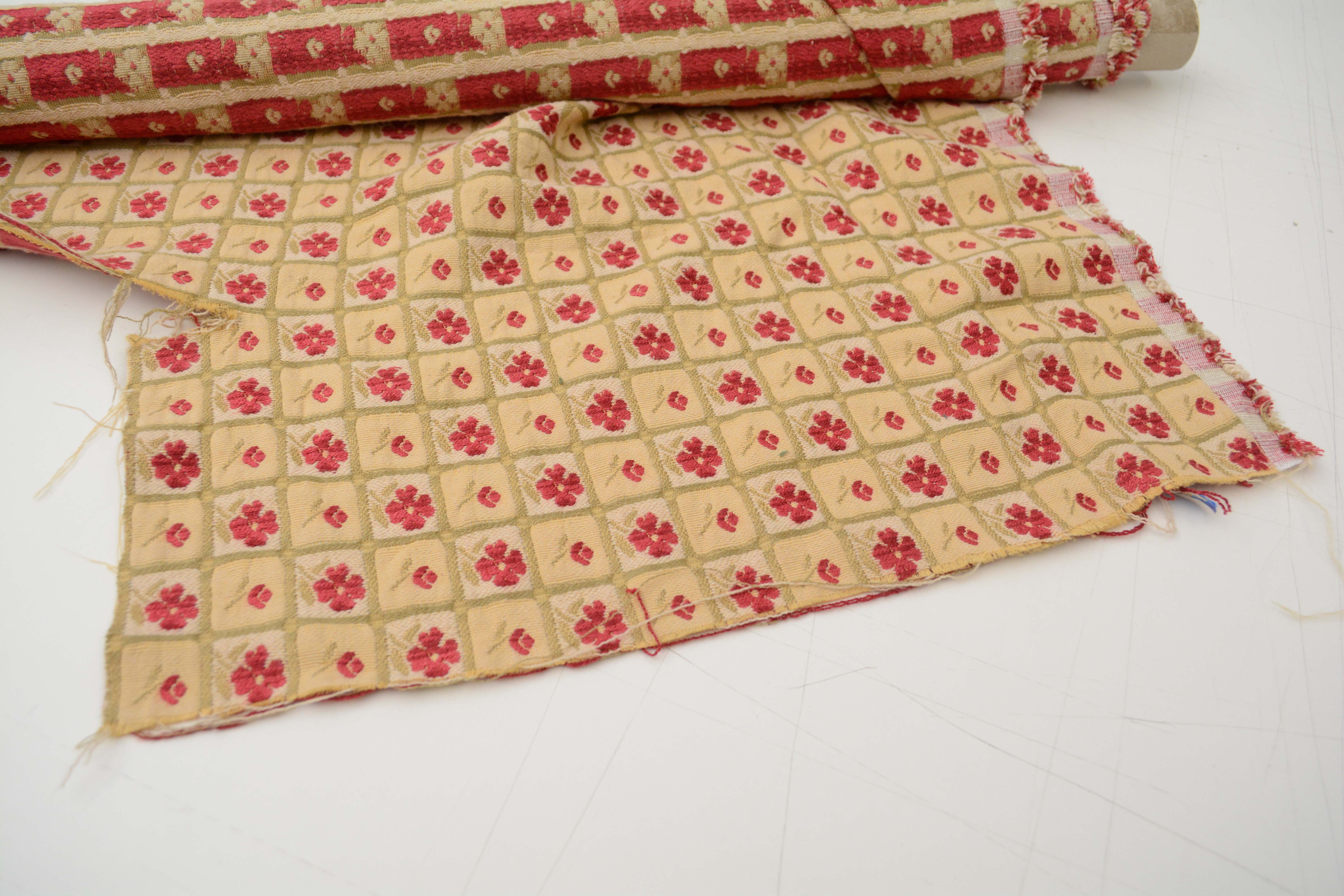 Red, Gold, and Green Embroidered Upholstery Fabric Bolts