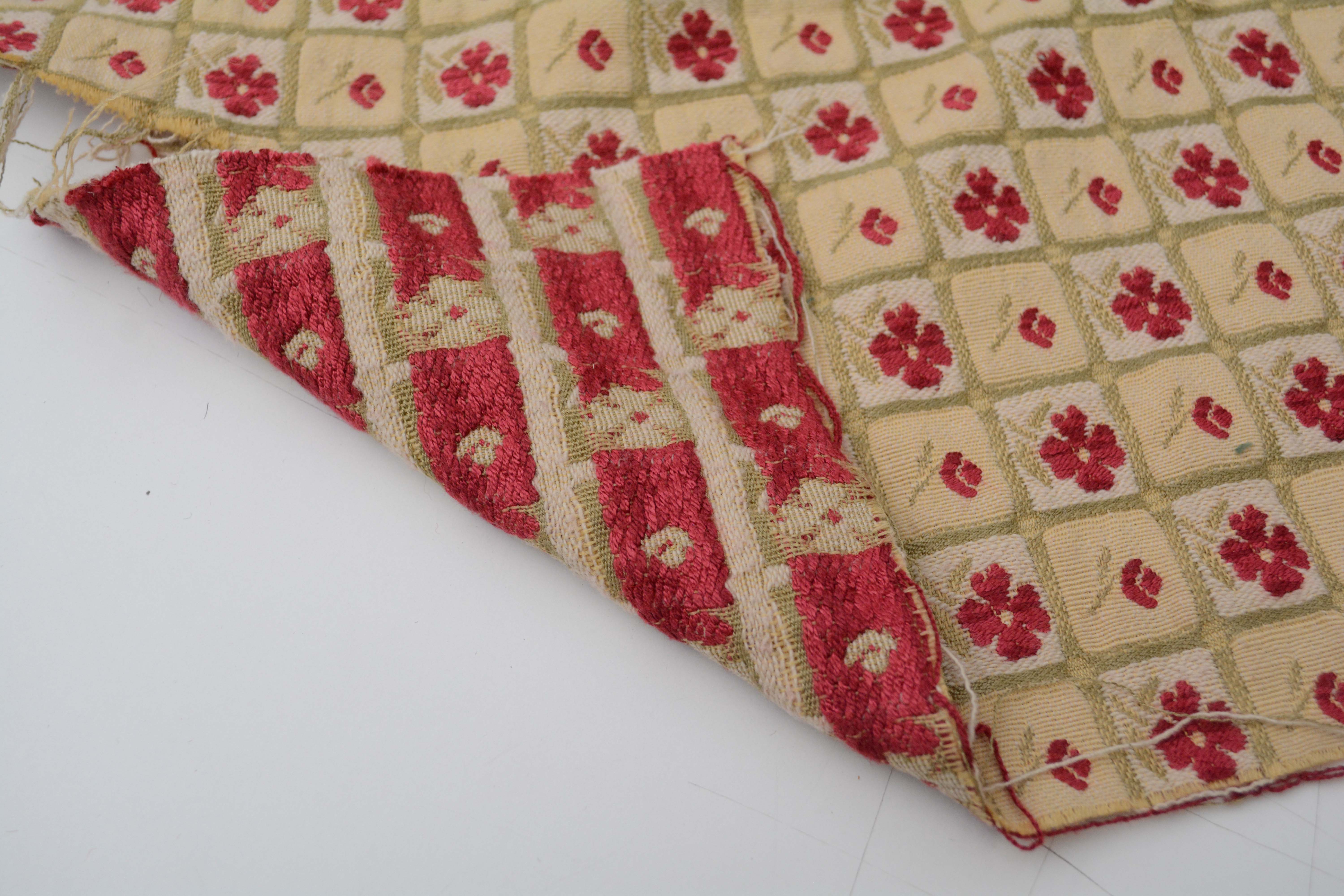 Red, Gold, and Green Embroidered Upholstery Fabric Bolts