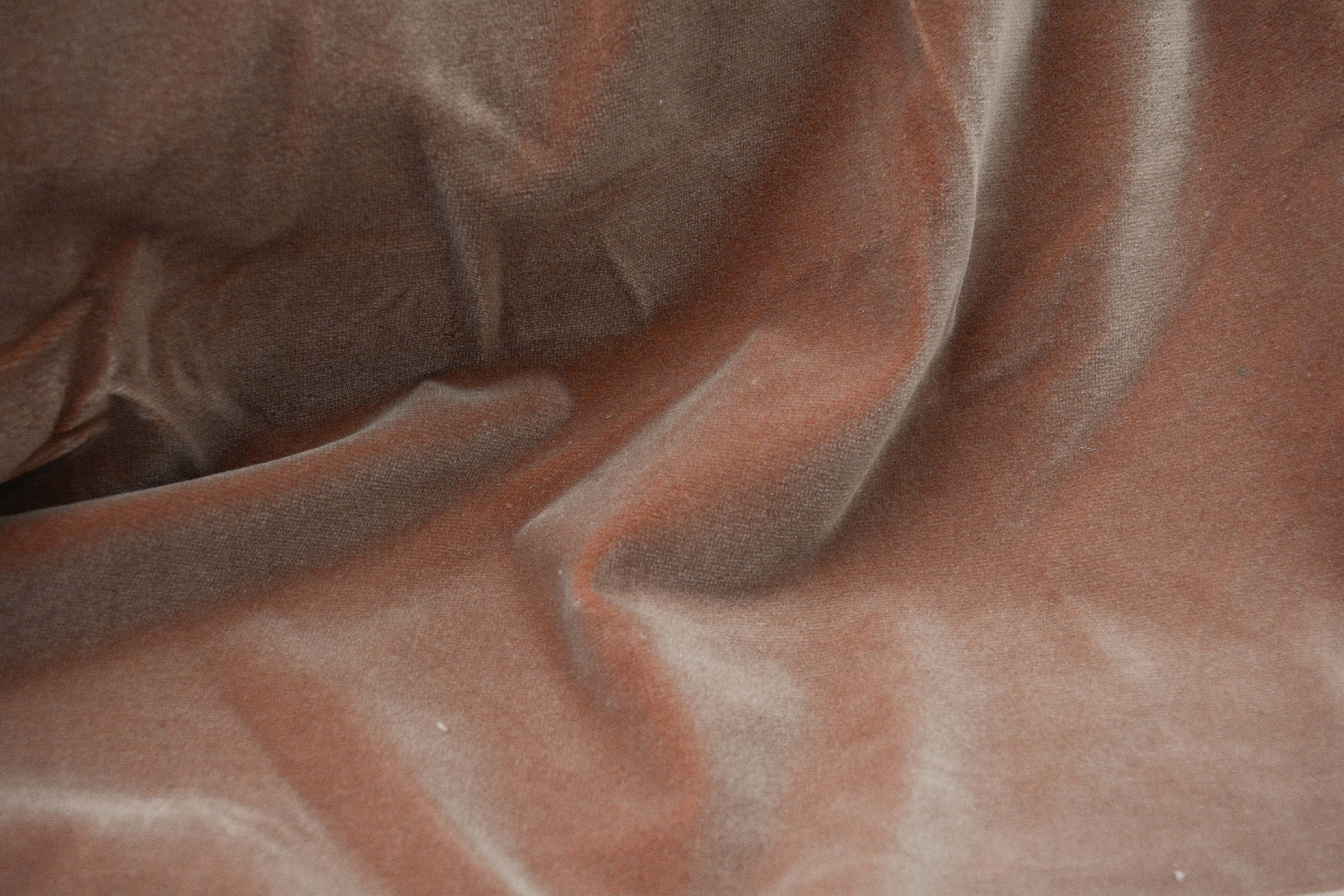 Tan and Red Velour Fabric Bolts