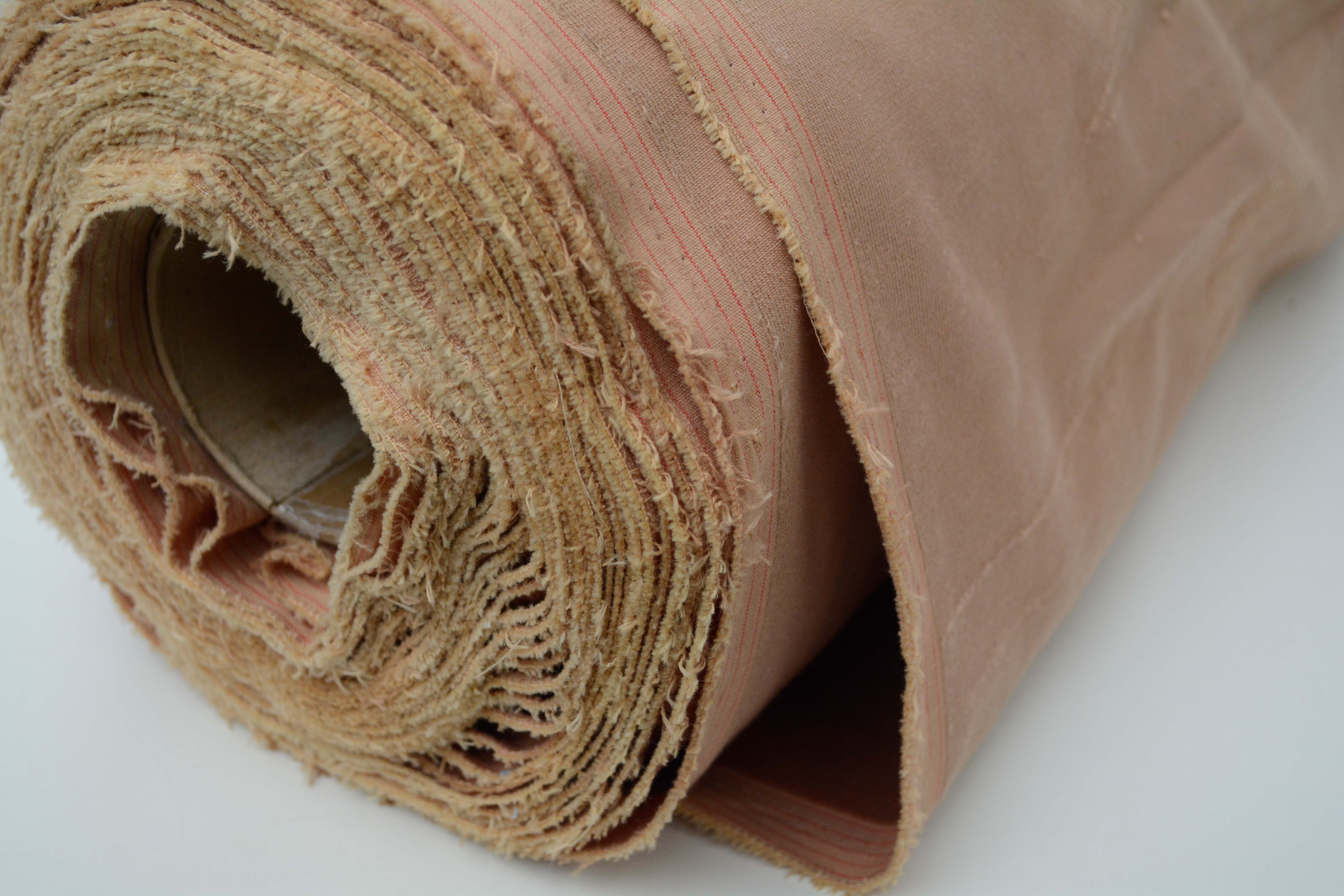 Tan and Red Velour Fabric Bolts