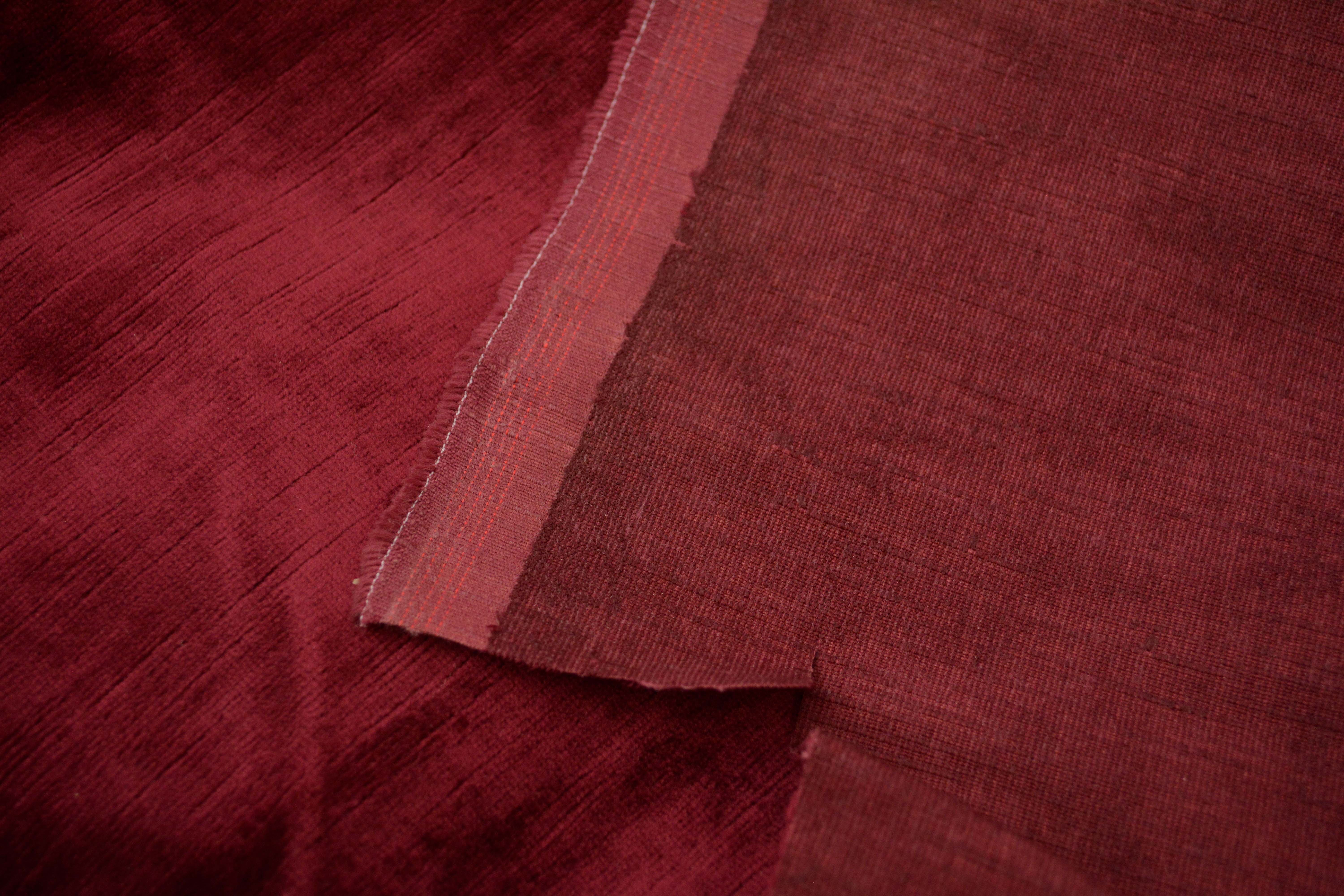 Tan and Red Velour Fabric Bolts