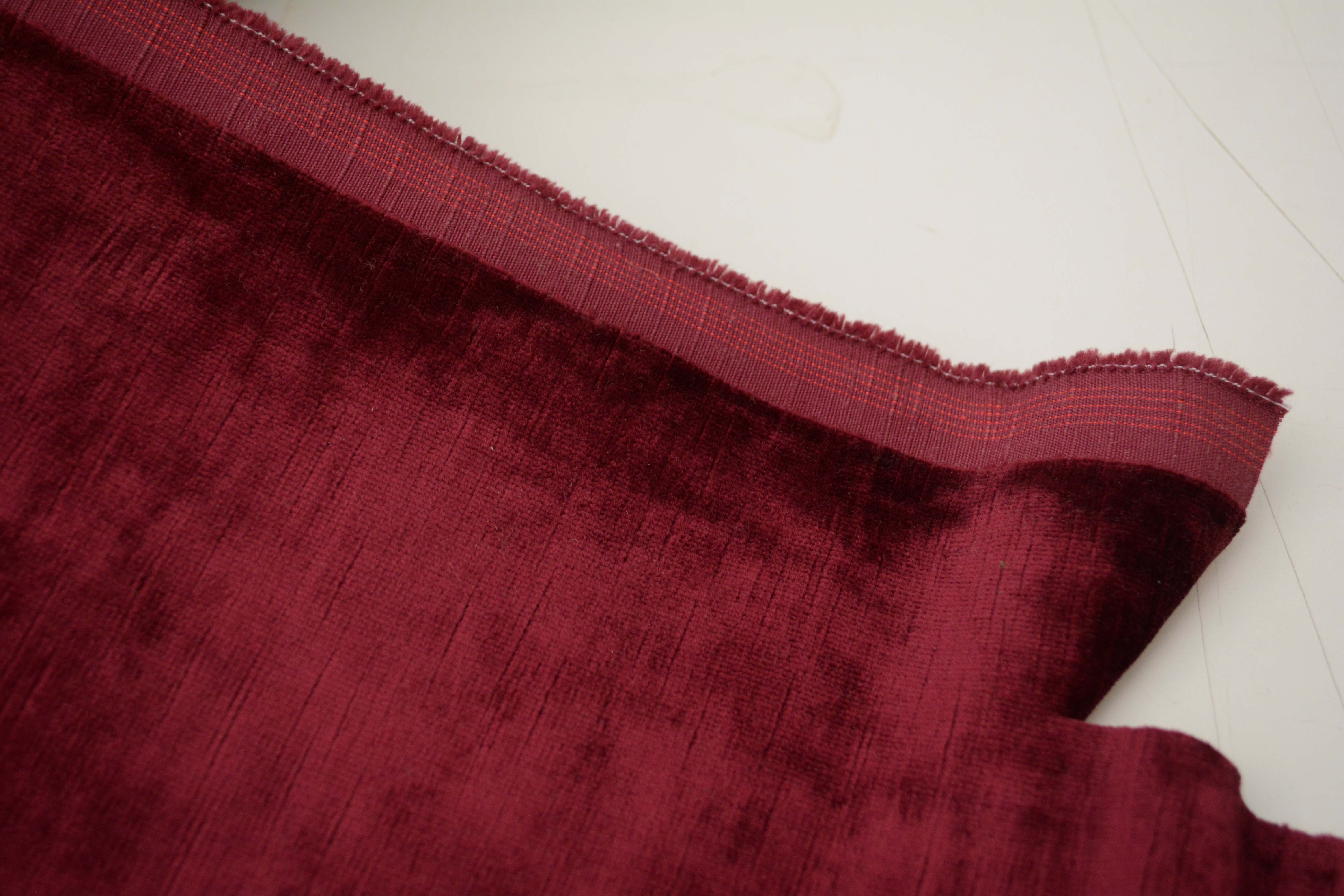 Tan and Red Velour Fabric Bolts