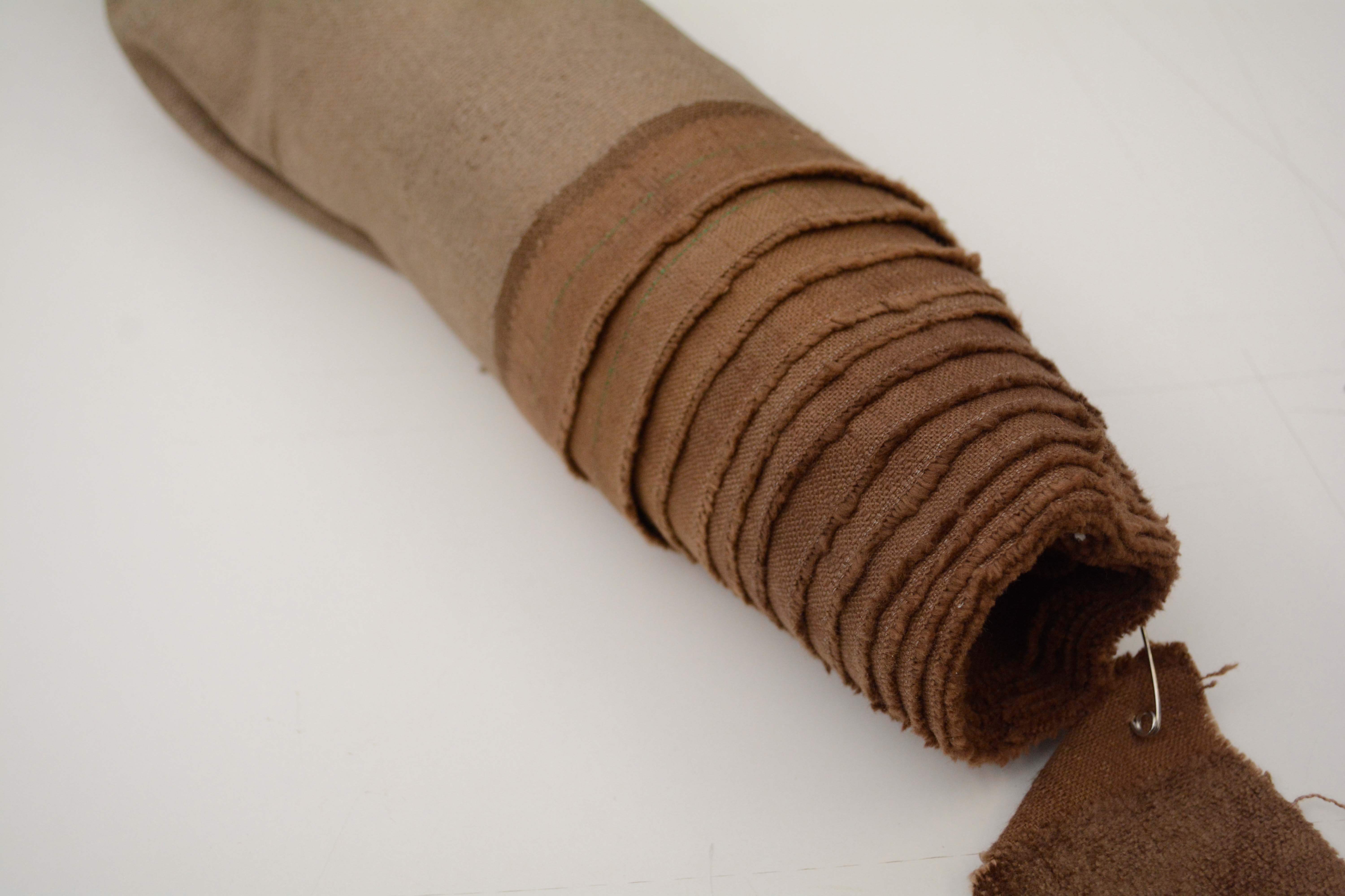 Tan and Brown Upholstery Fabric Bolts