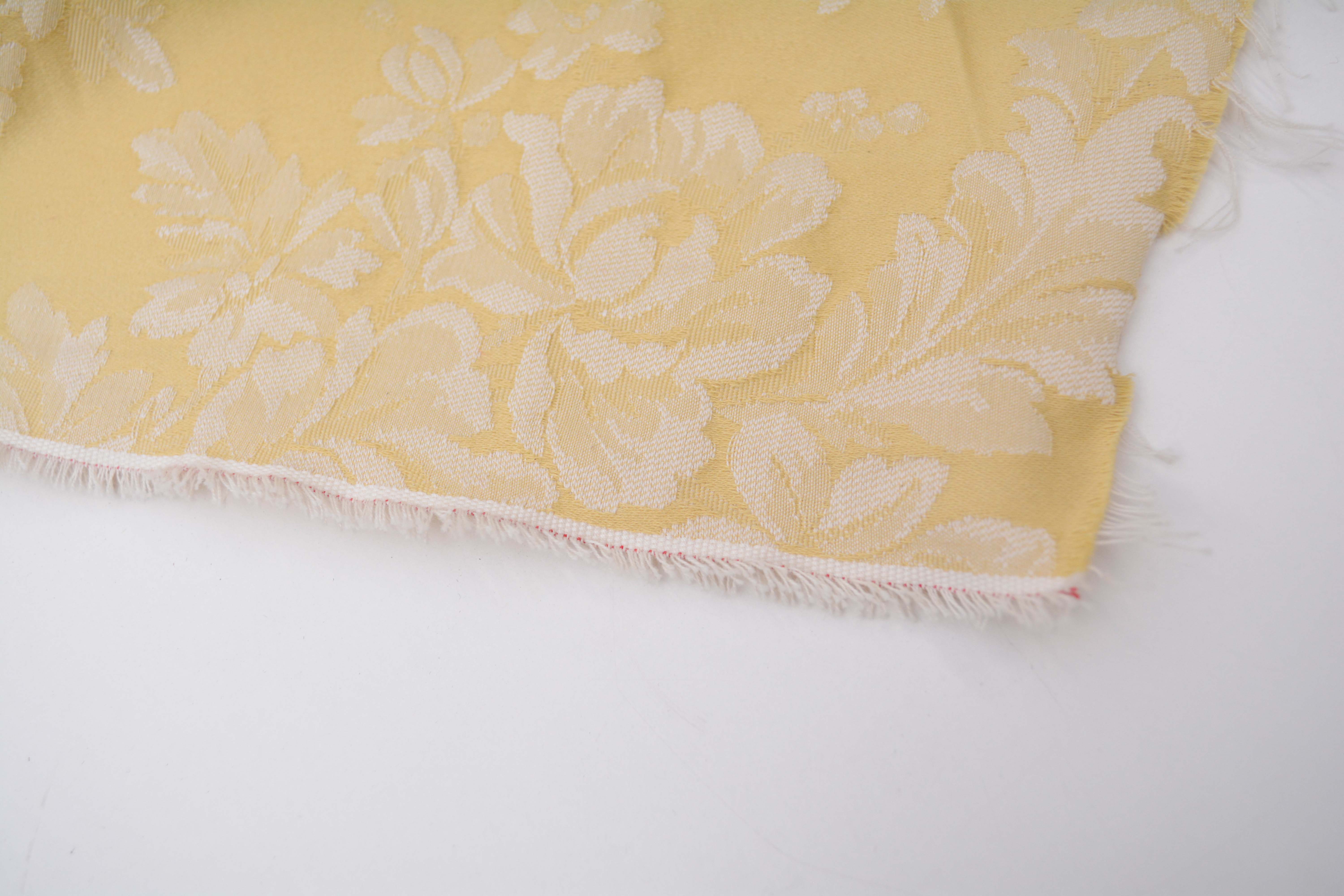 Cream and Gold Colored Upholstery Fabric Bolts