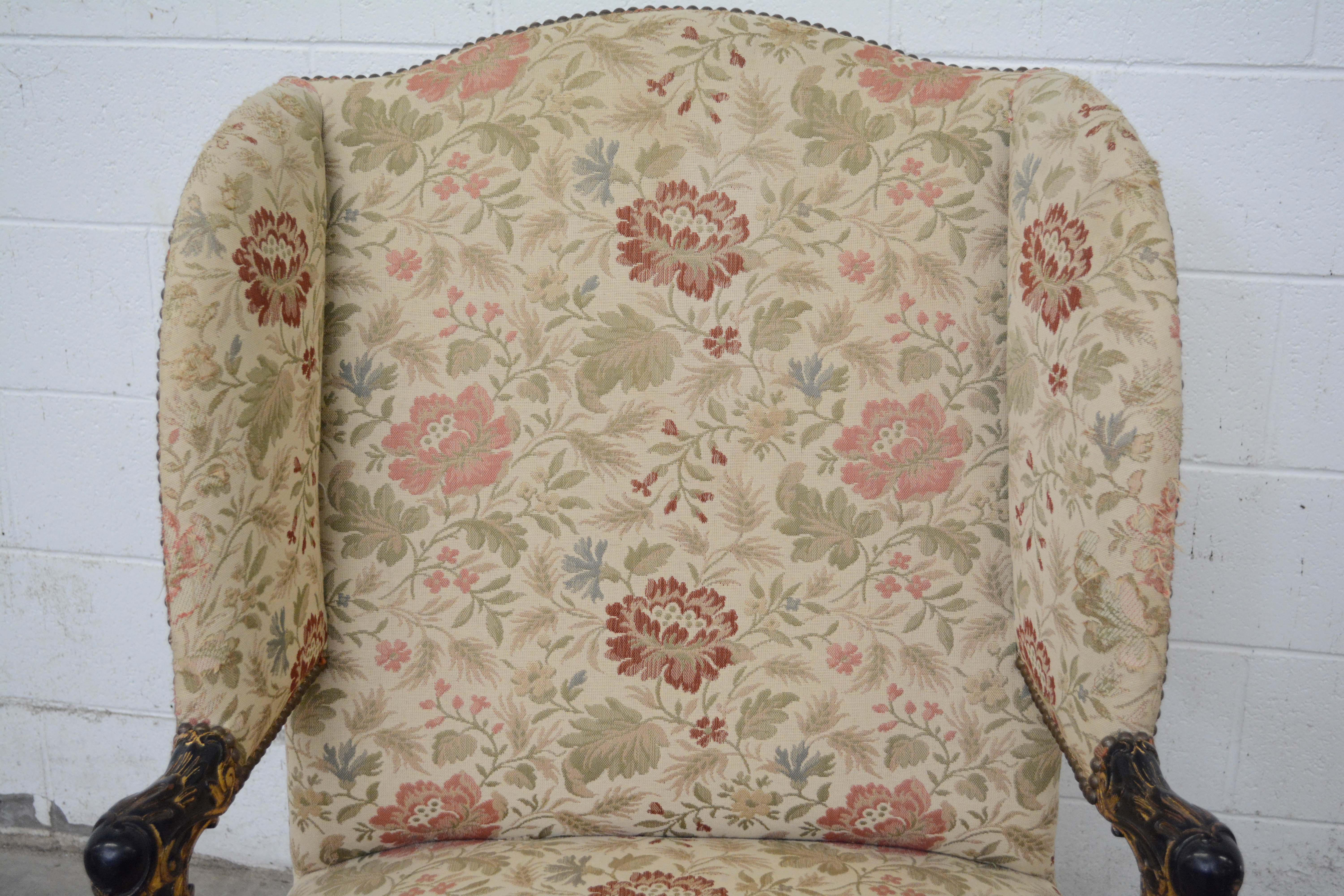 George II Style Ebonized and Parcel-Gilt Wingback Armchair, 20th Century