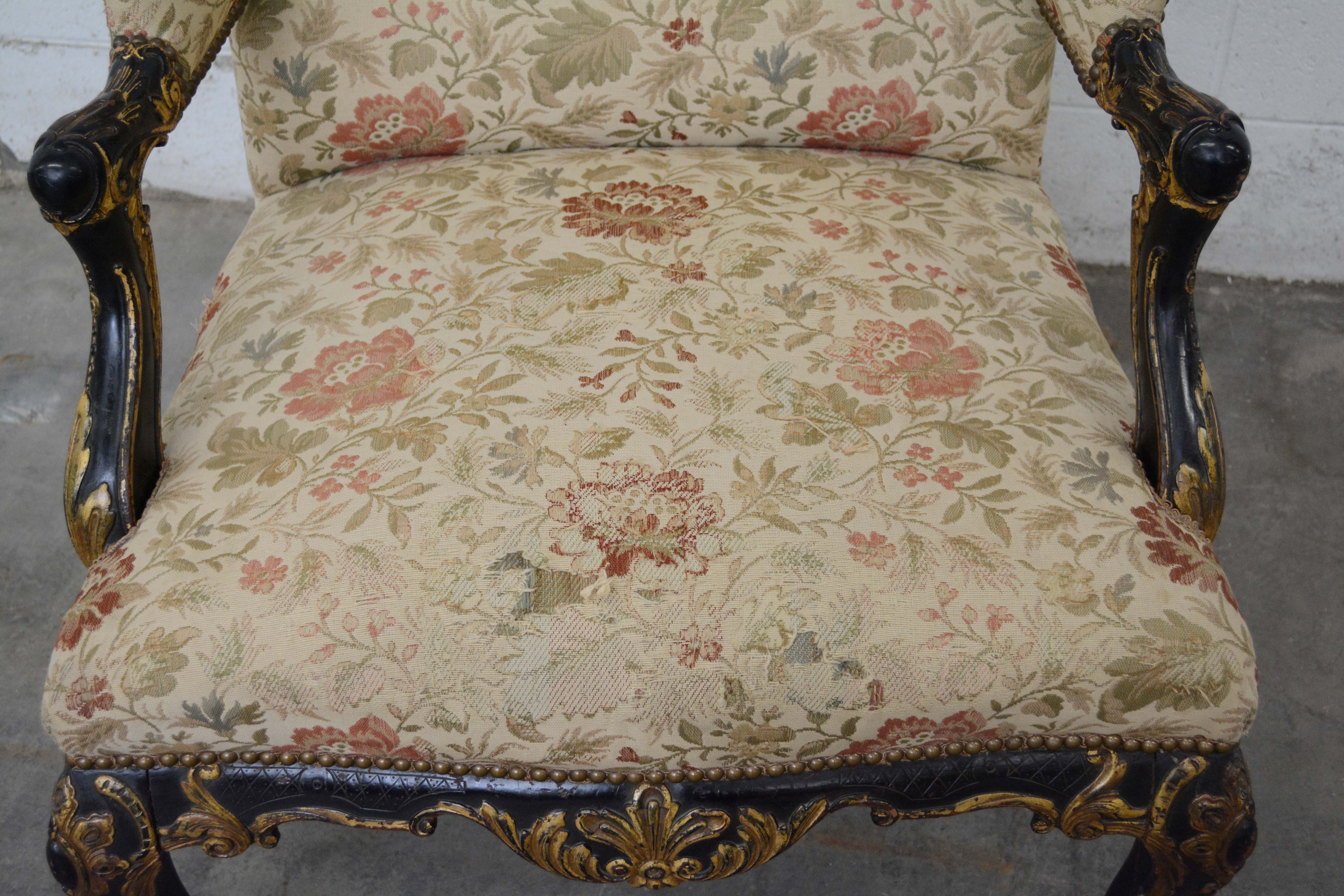 George II Style Ebonized and Parcel-Gilt Wingback Armchair, 20th Century