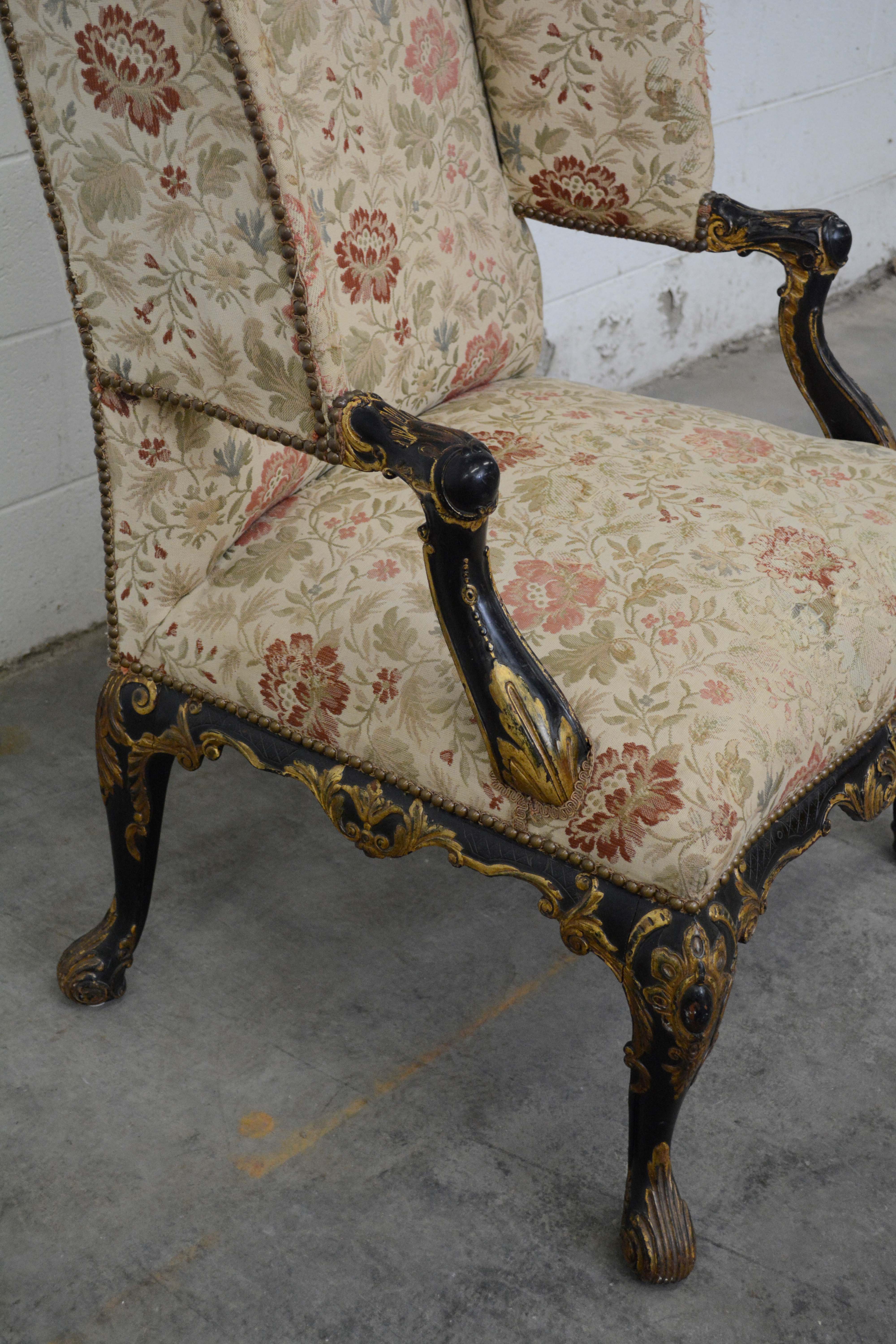 George II Style Ebonized and Parcel-Gilt Wingback Armchair, 20th Century
