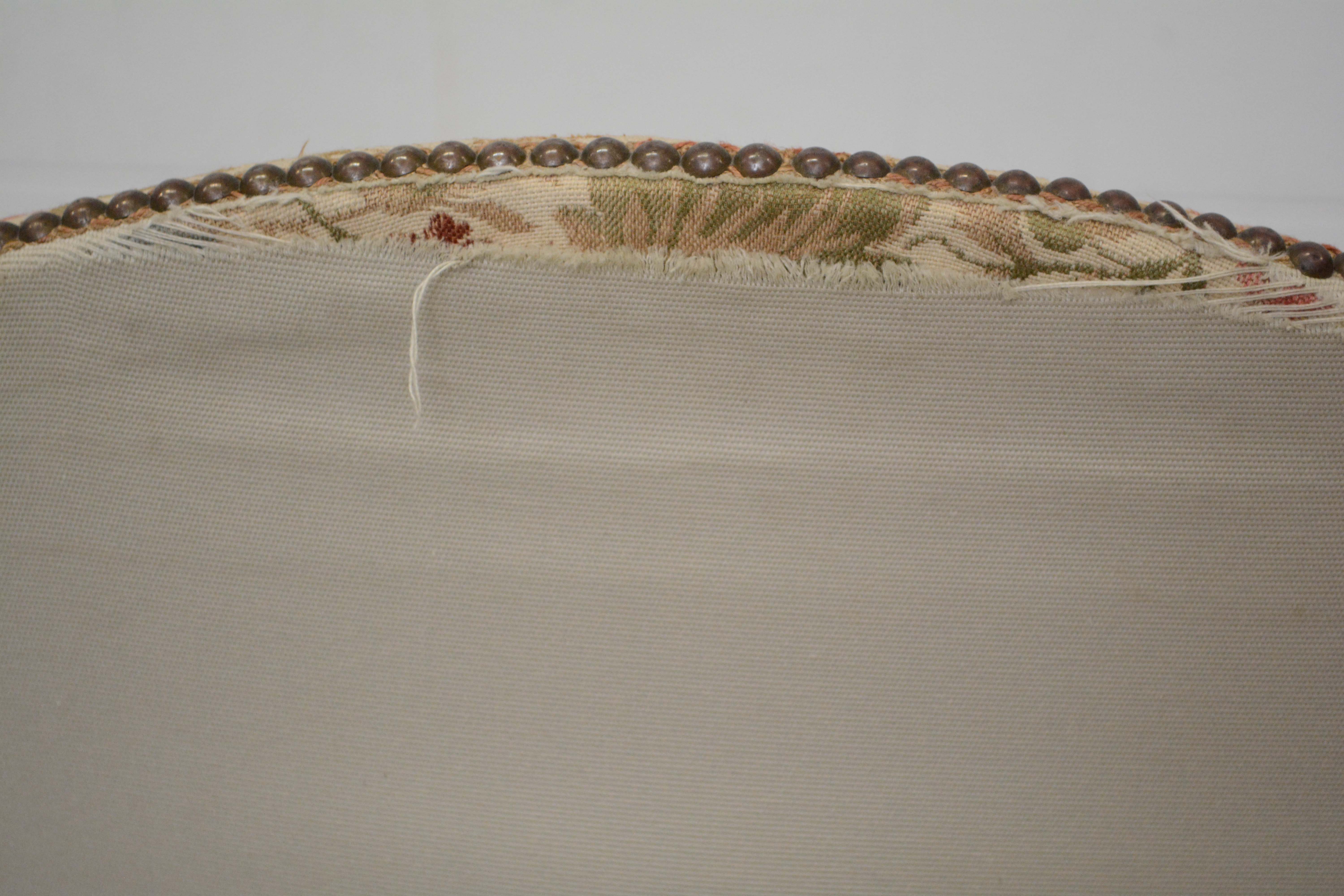 George II Style Ebonized and Parcel-Gilt Wingback Armchair, 20th Century