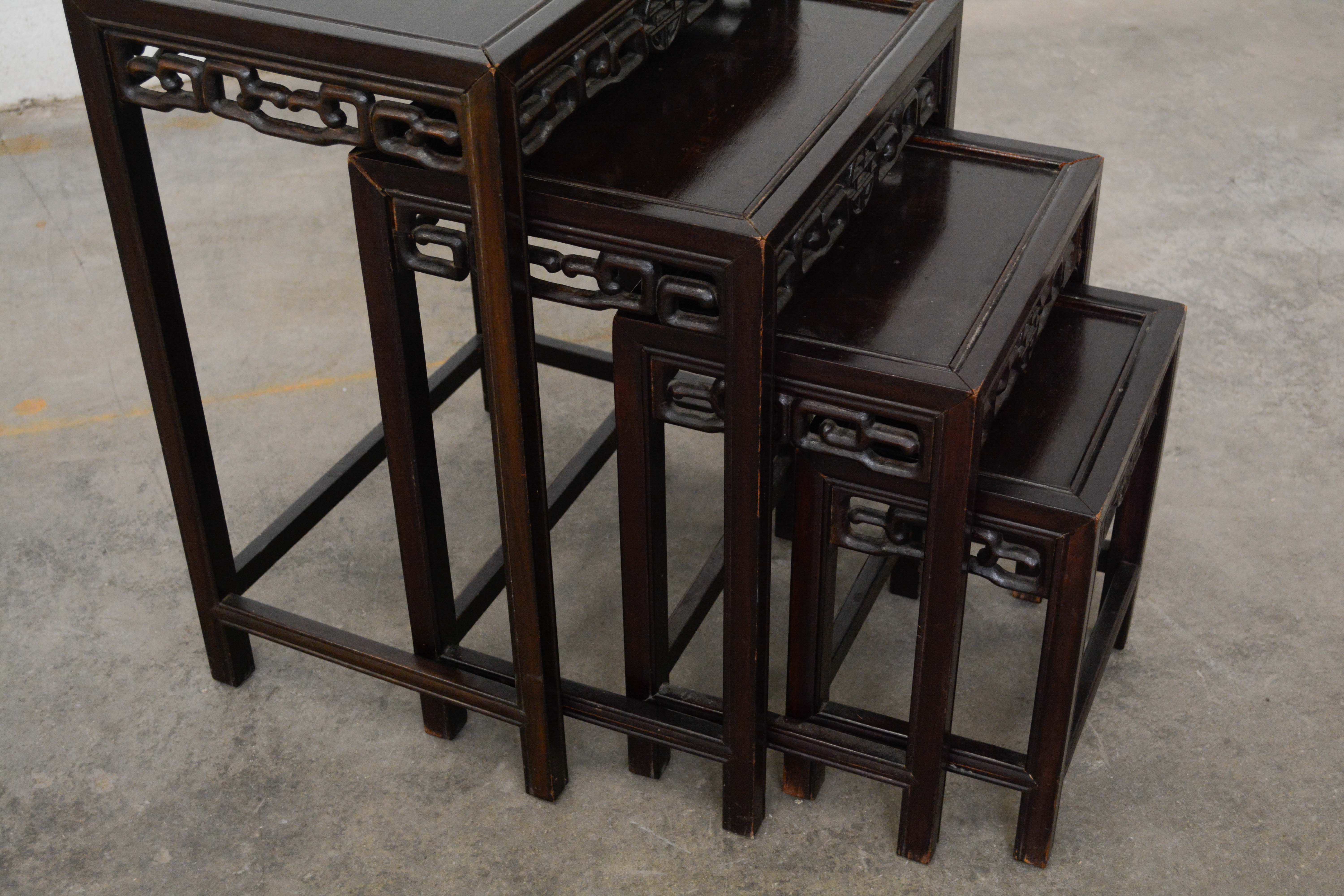 Set of Chinese Export Carved Hardwood Quartetto Tables, Early 20th Century