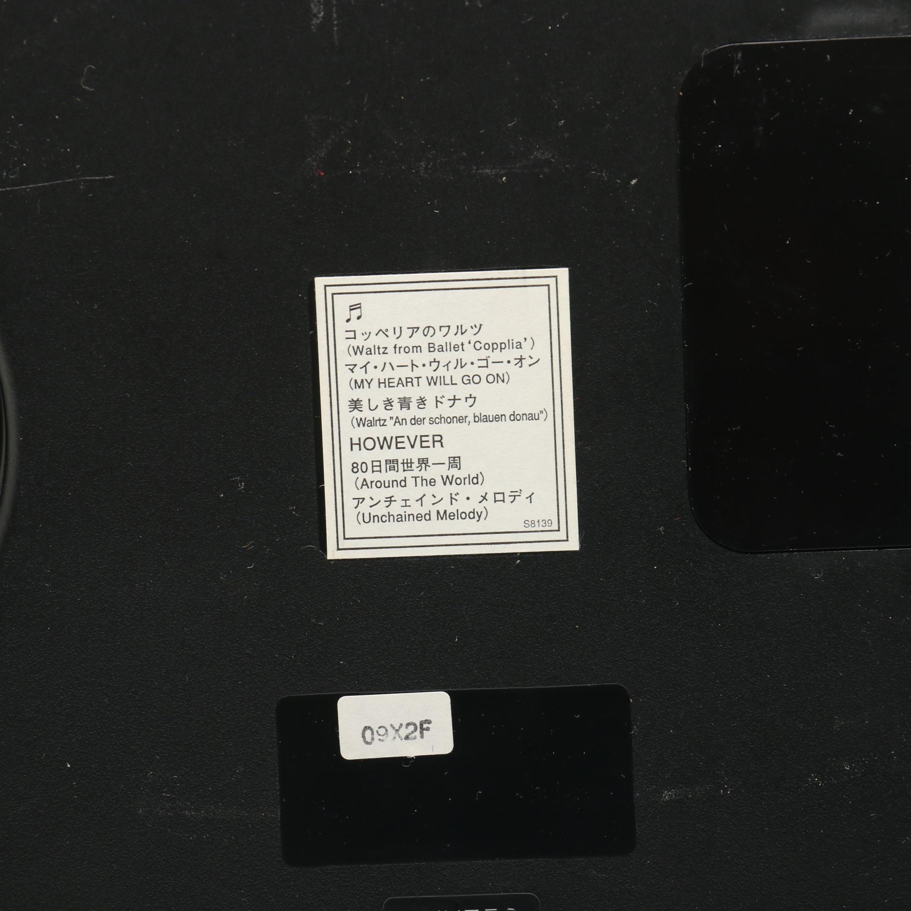 Rhythm "Small World" Musical Wall Clock