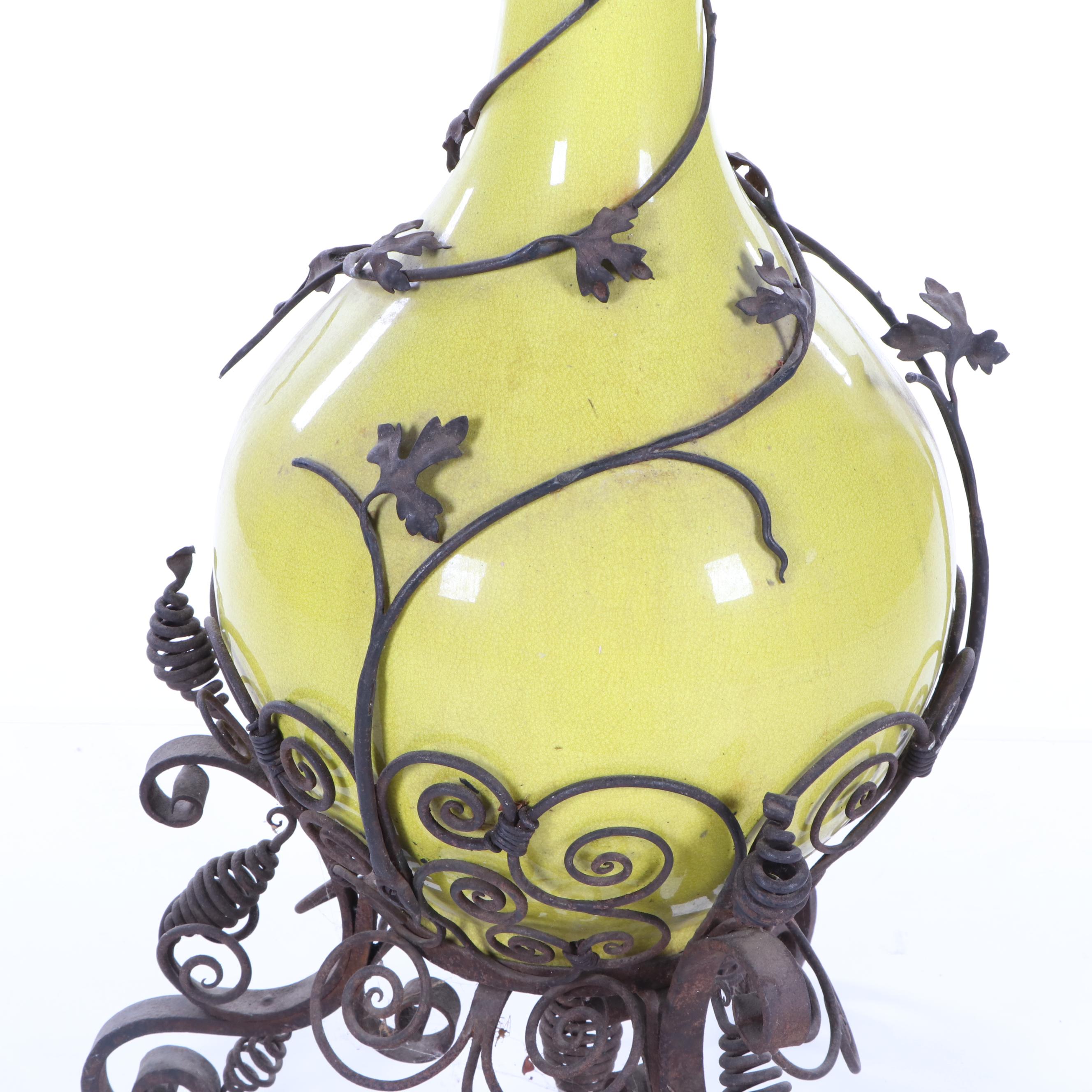 Oversized Yellow Glazed Vase Mounted in Scrolled Wrought Iron Work