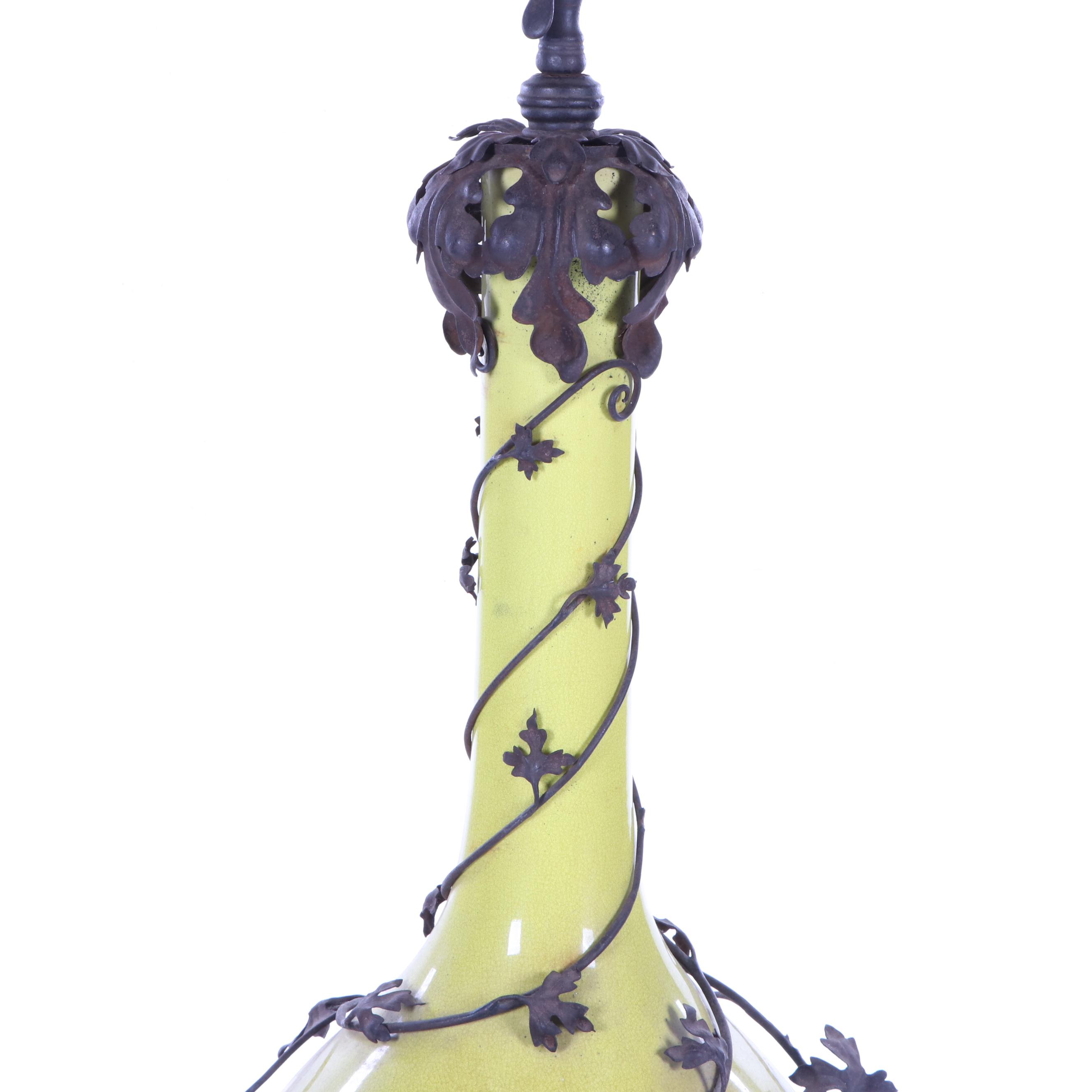 Oversized Yellow Glazed Vase Mounted in Scrolled Wrought Iron Work